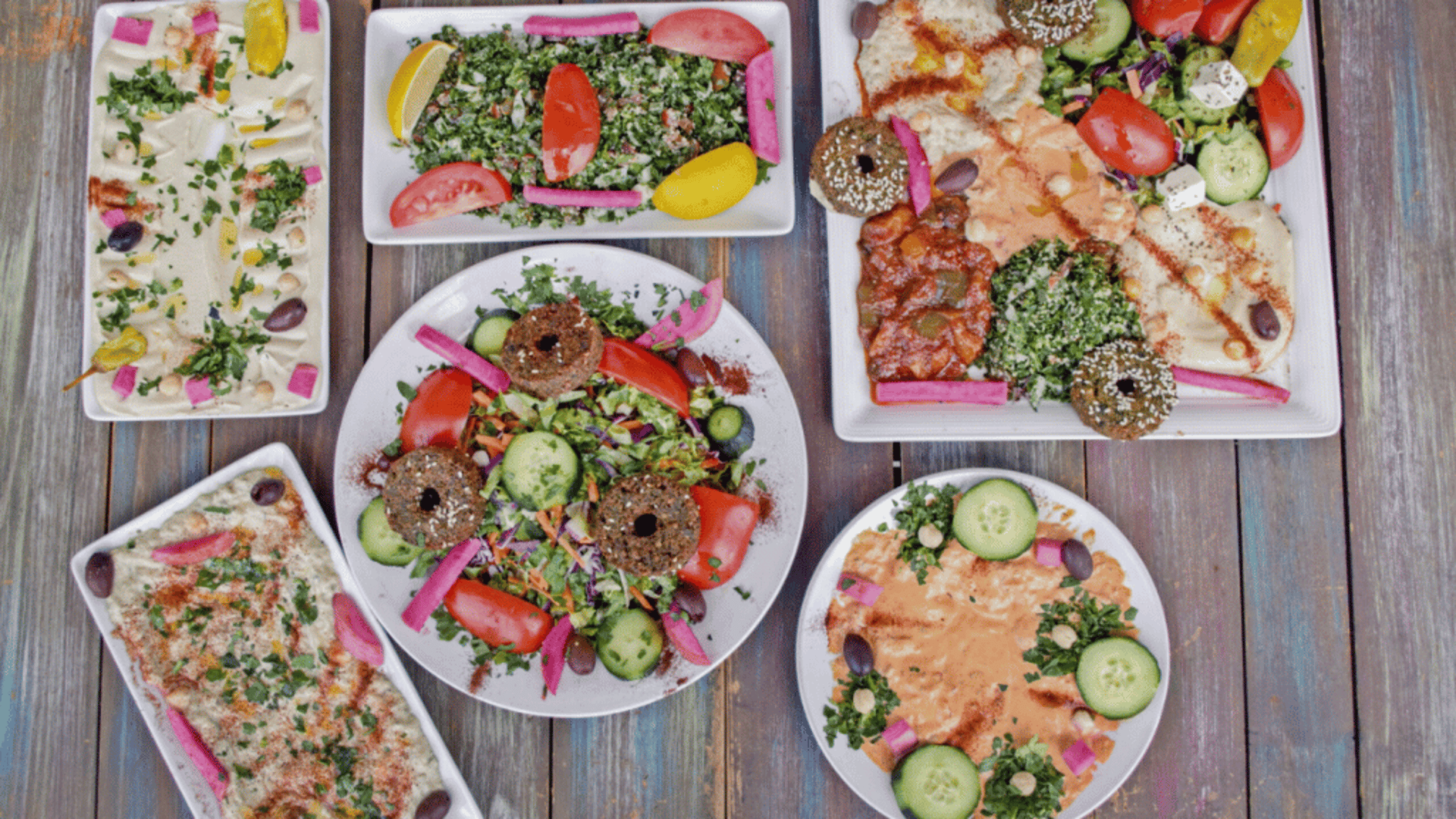 a plate of food with bread and salad