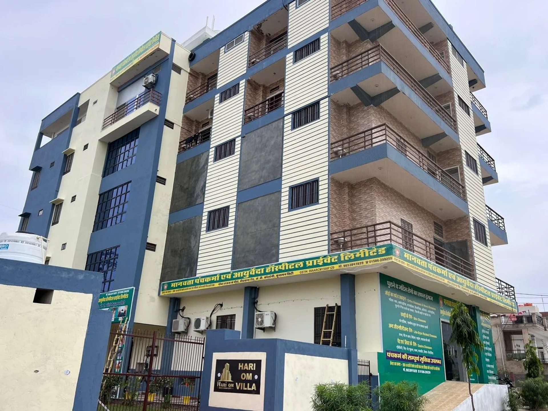 black and brown leather padded tub sofa
