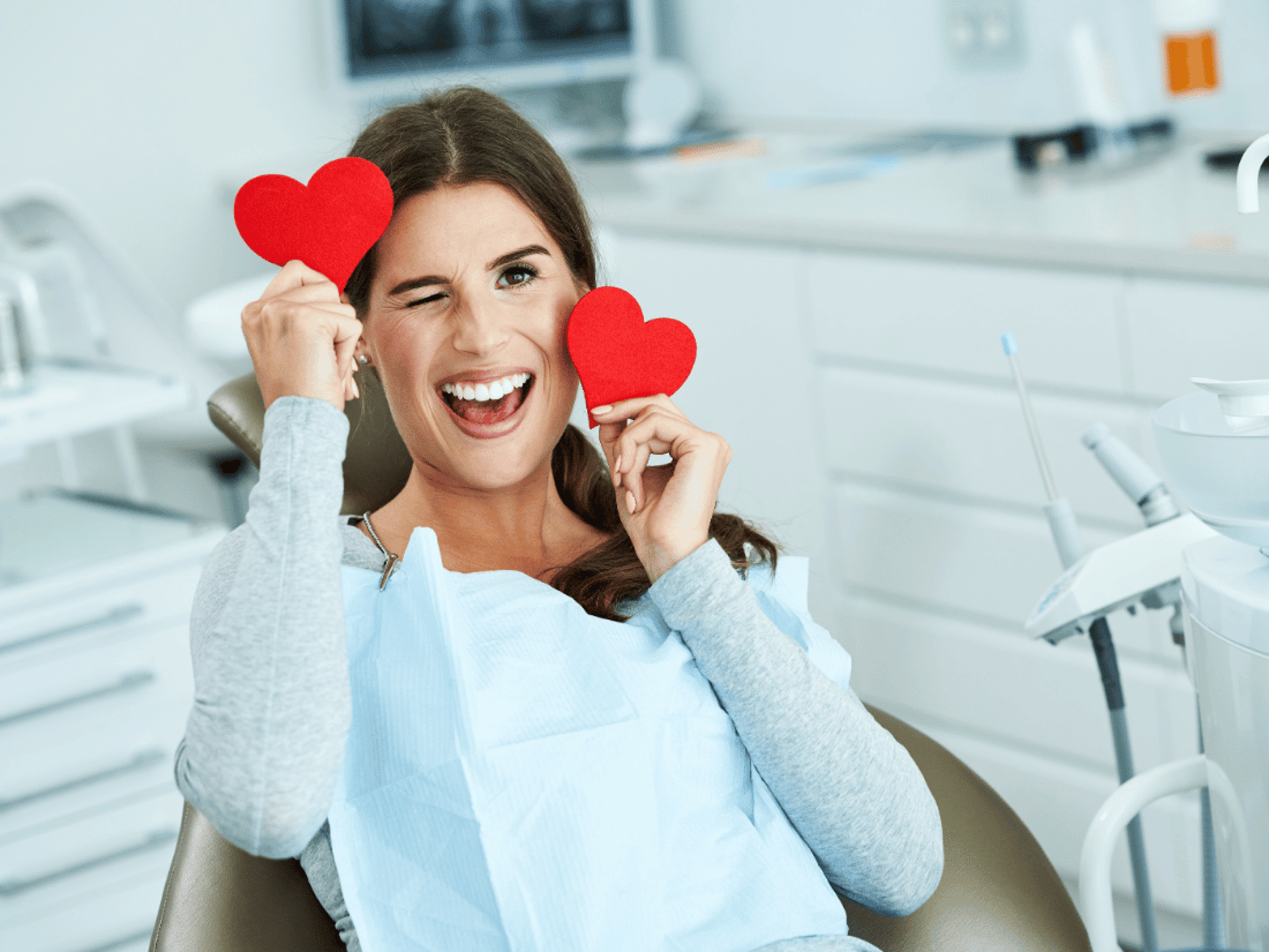 an abstract photo of a curved building with a blue sky in the background