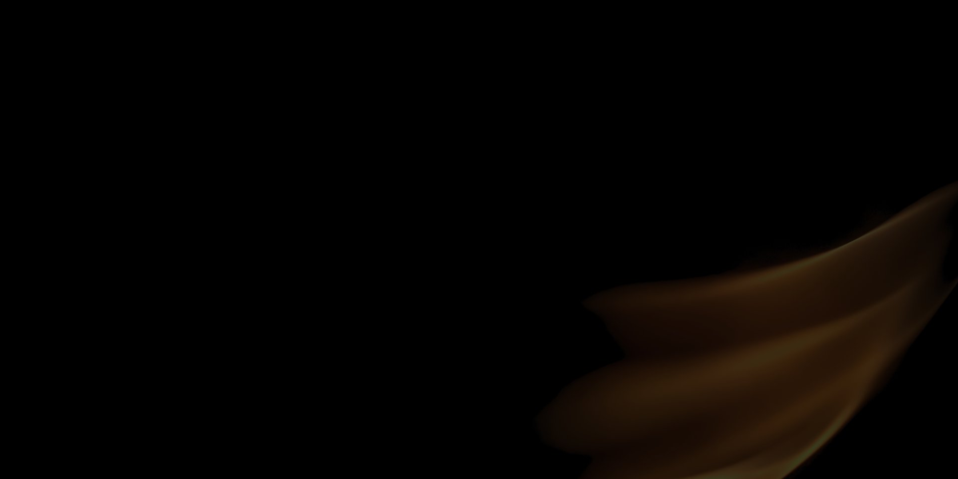 a close up of a black and brown abstract painting