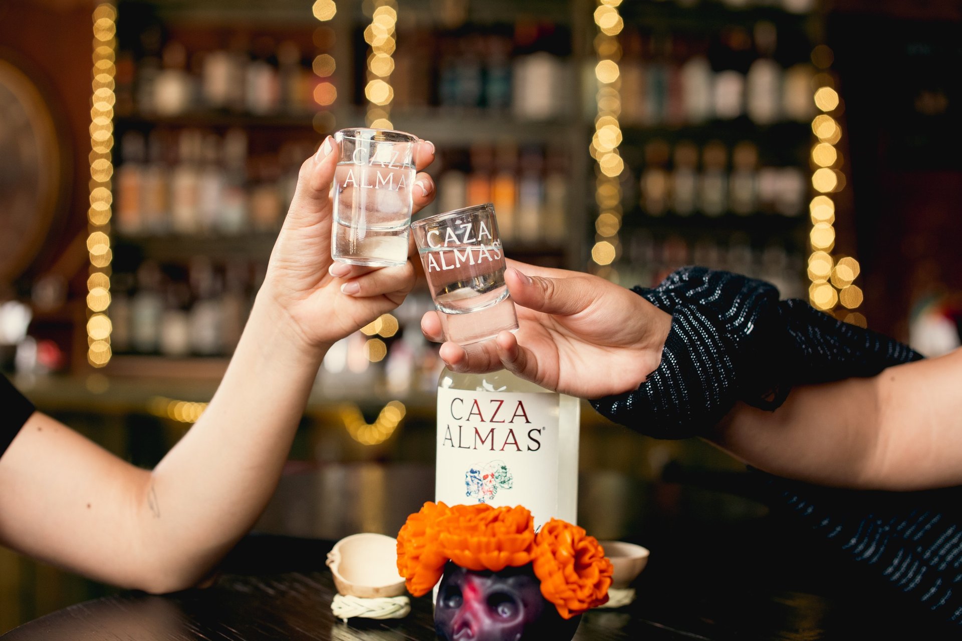 woman wearing yellow long-sleeved dress under white clouds and blue sky during daytime