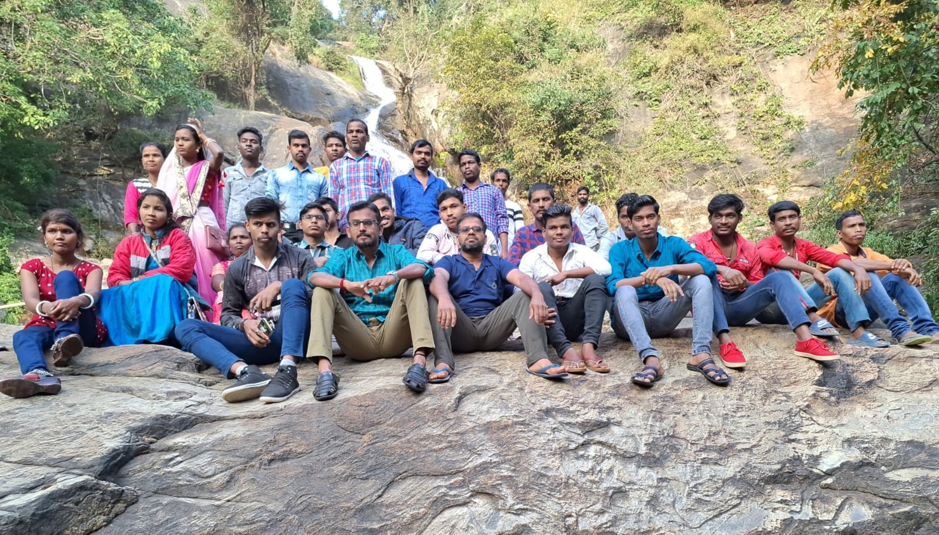 woman wearing yellow long-sleeved dress under white clouds and blue sky during daytime