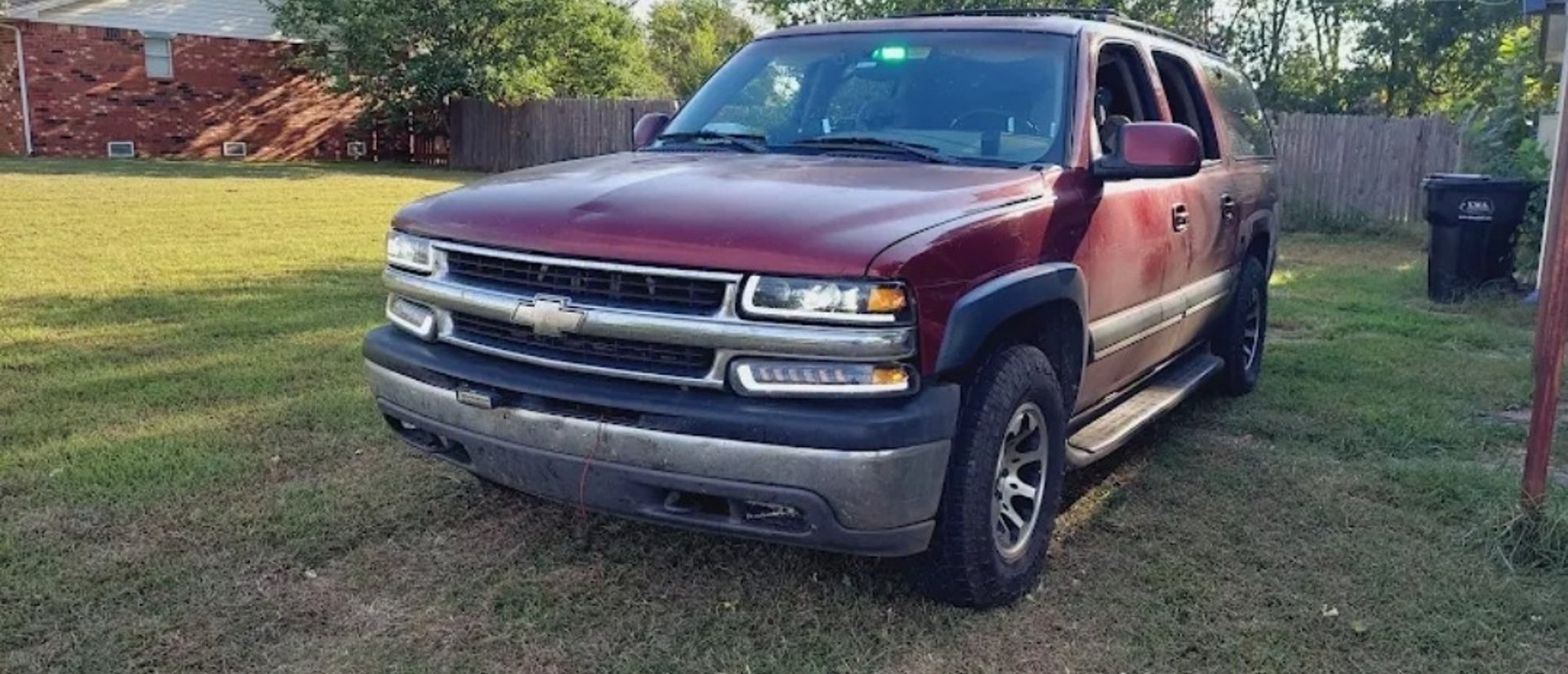 black and brown leather padded tub sofa