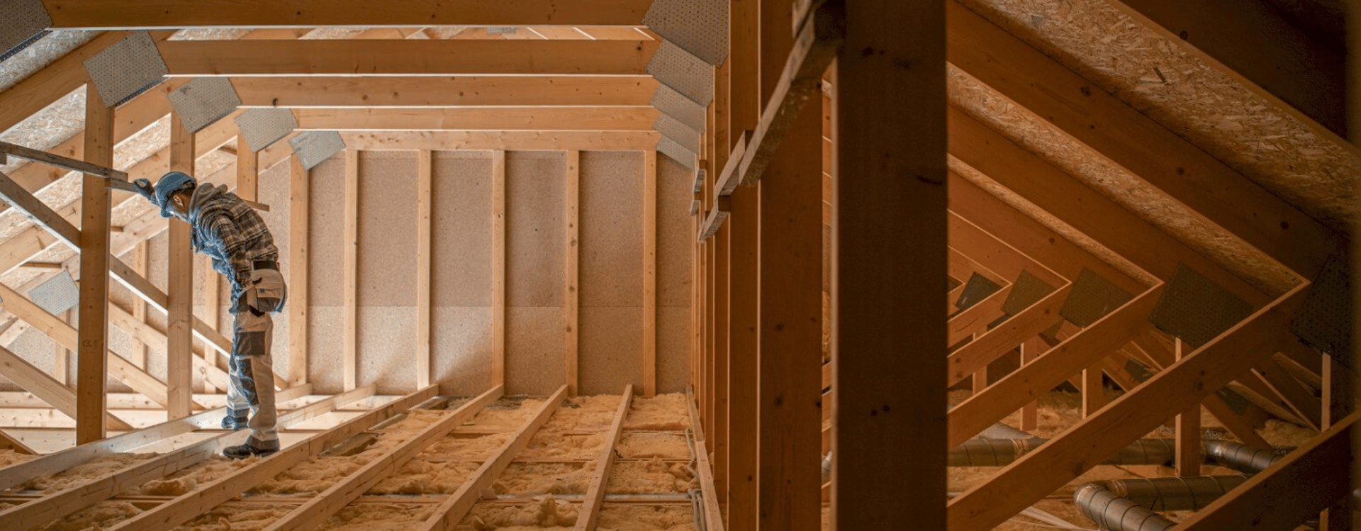 an abstract photo of a curved building with a blue sky in the background