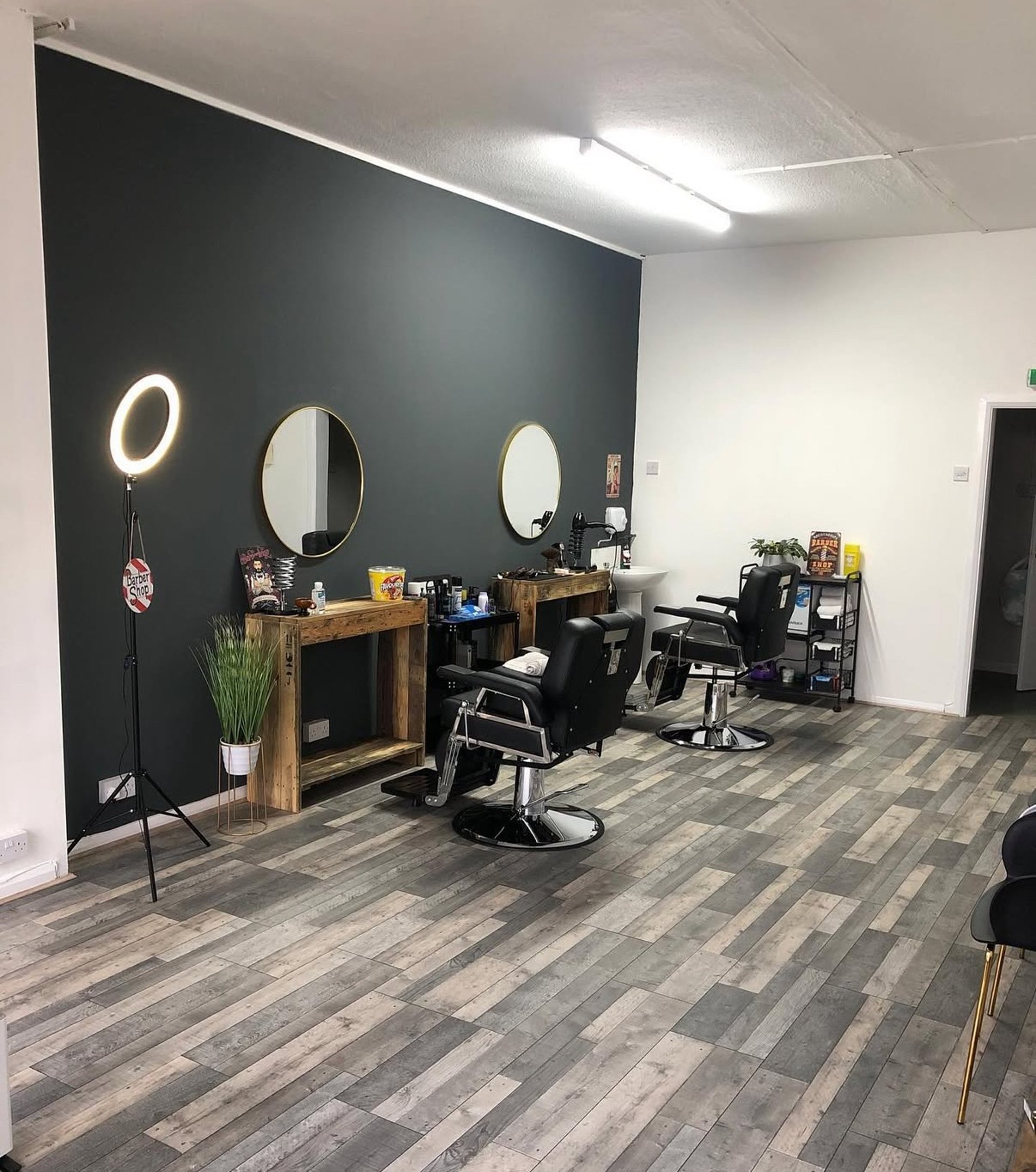 black and brown leather padded tub sofa