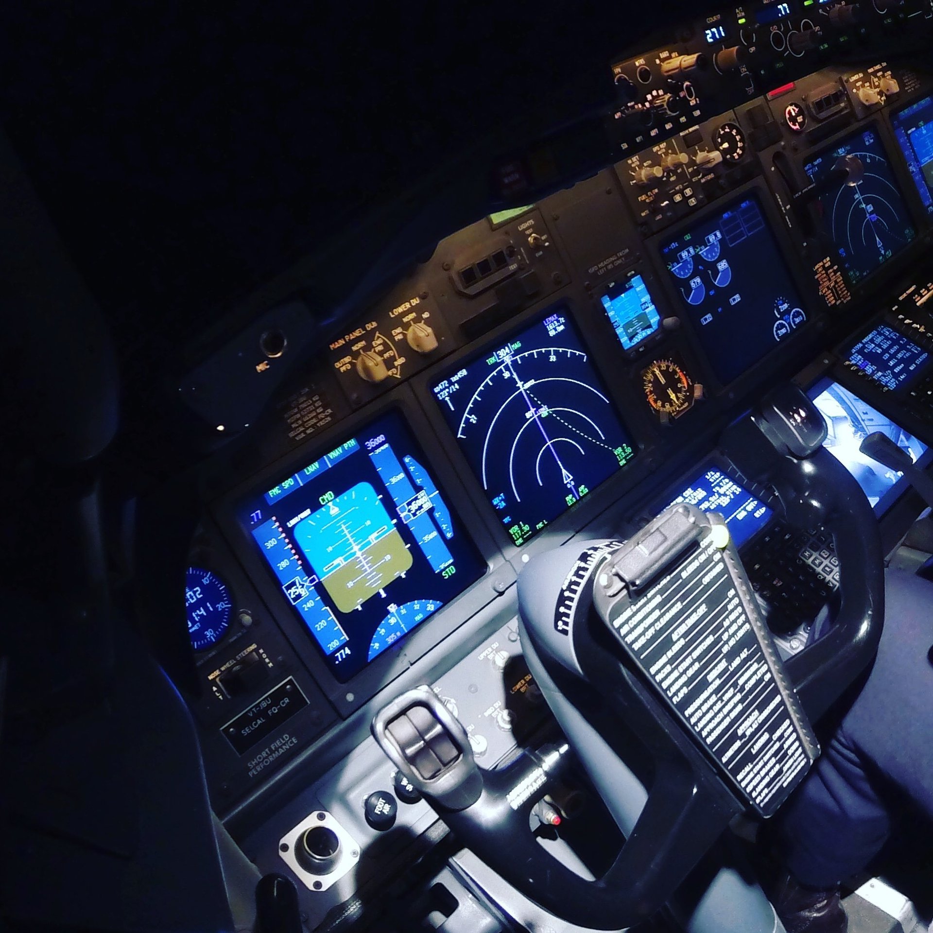an abstract photo of a curved building with a blue sky in the background