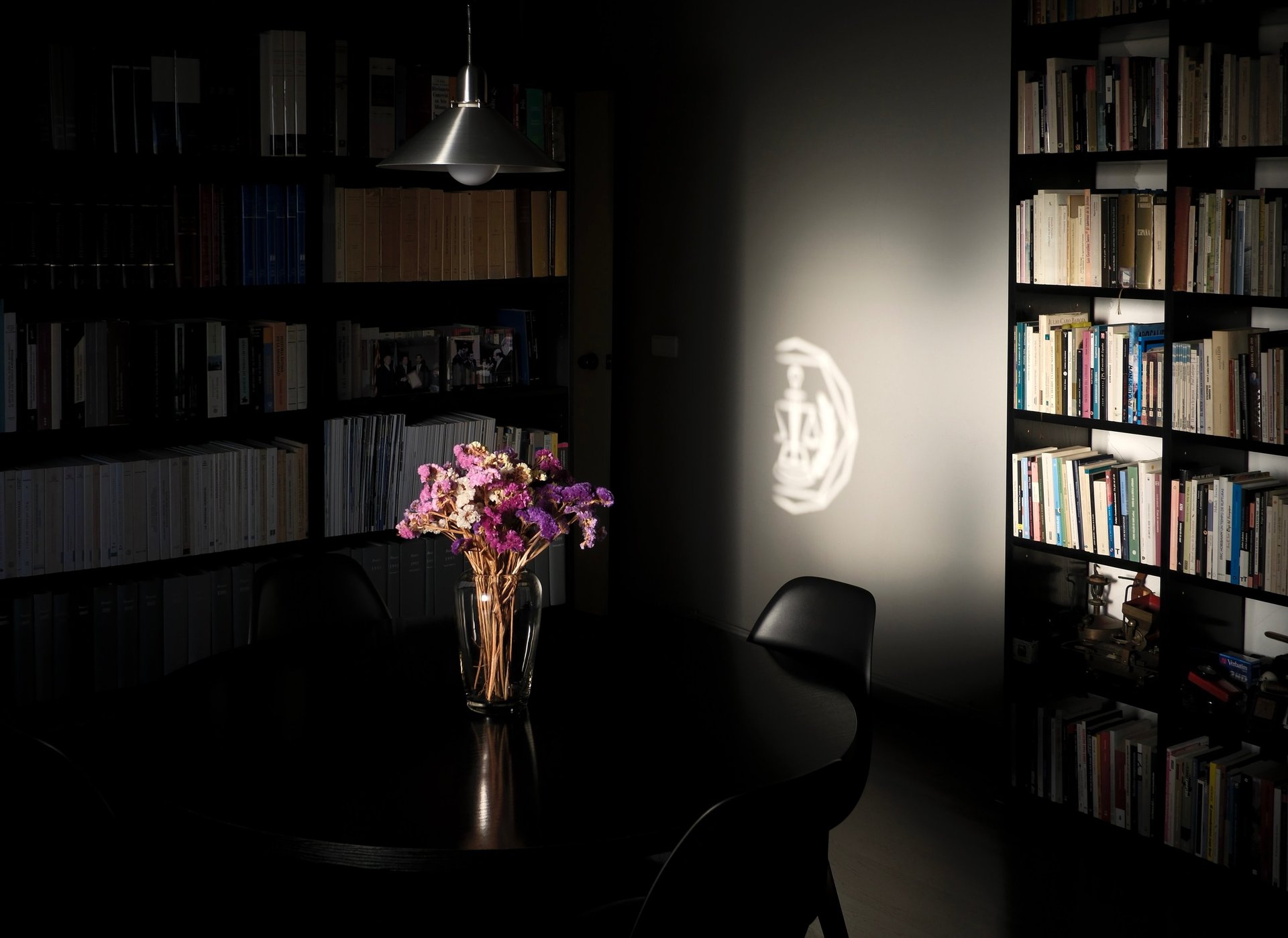an abstract photo of a curved building with a blue sky in the background