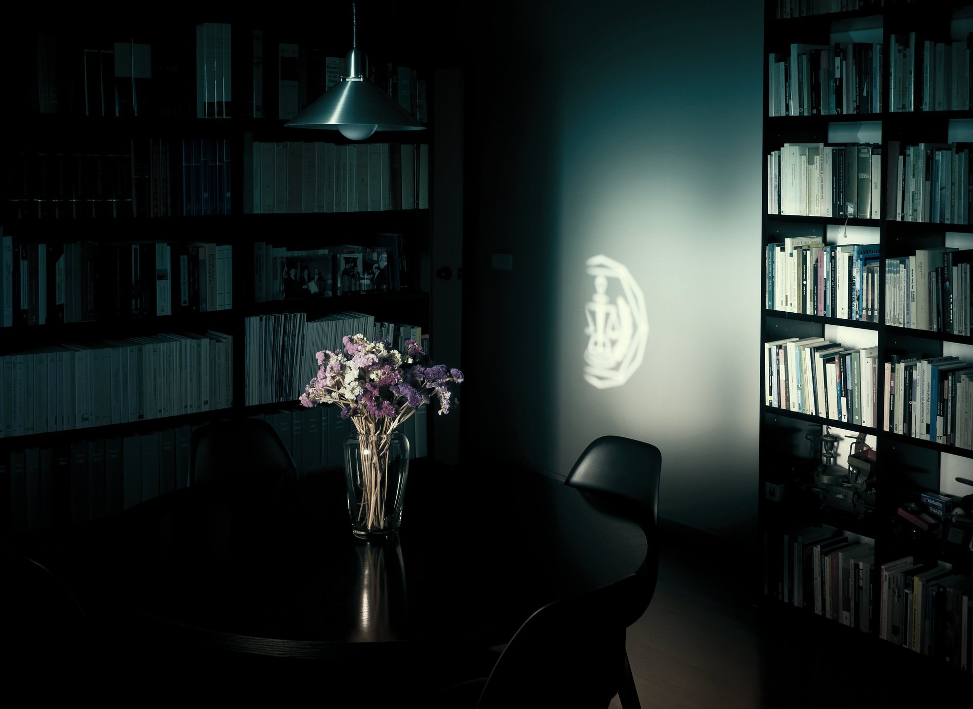 an abstract photo of a curved building with a blue sky in the background