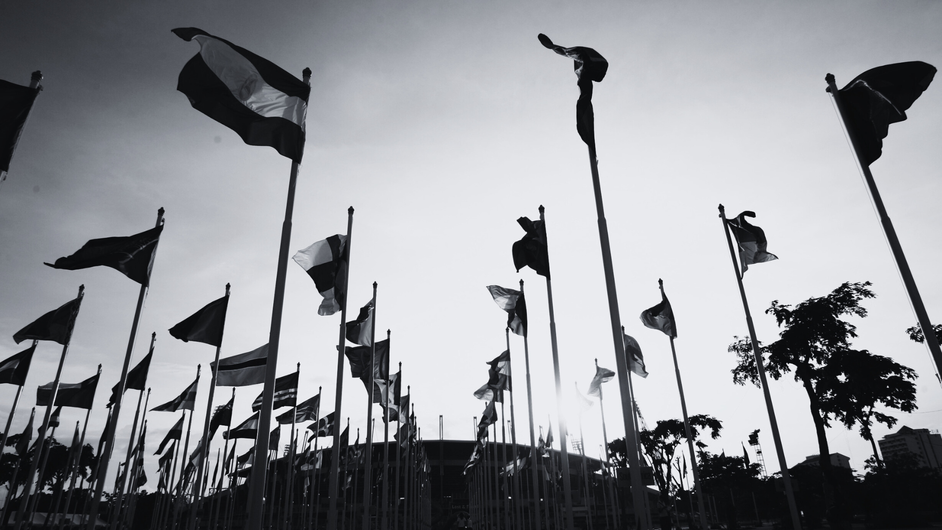 woman wearing yellow long-sleeved dress under white clouds and blue sky during daytime