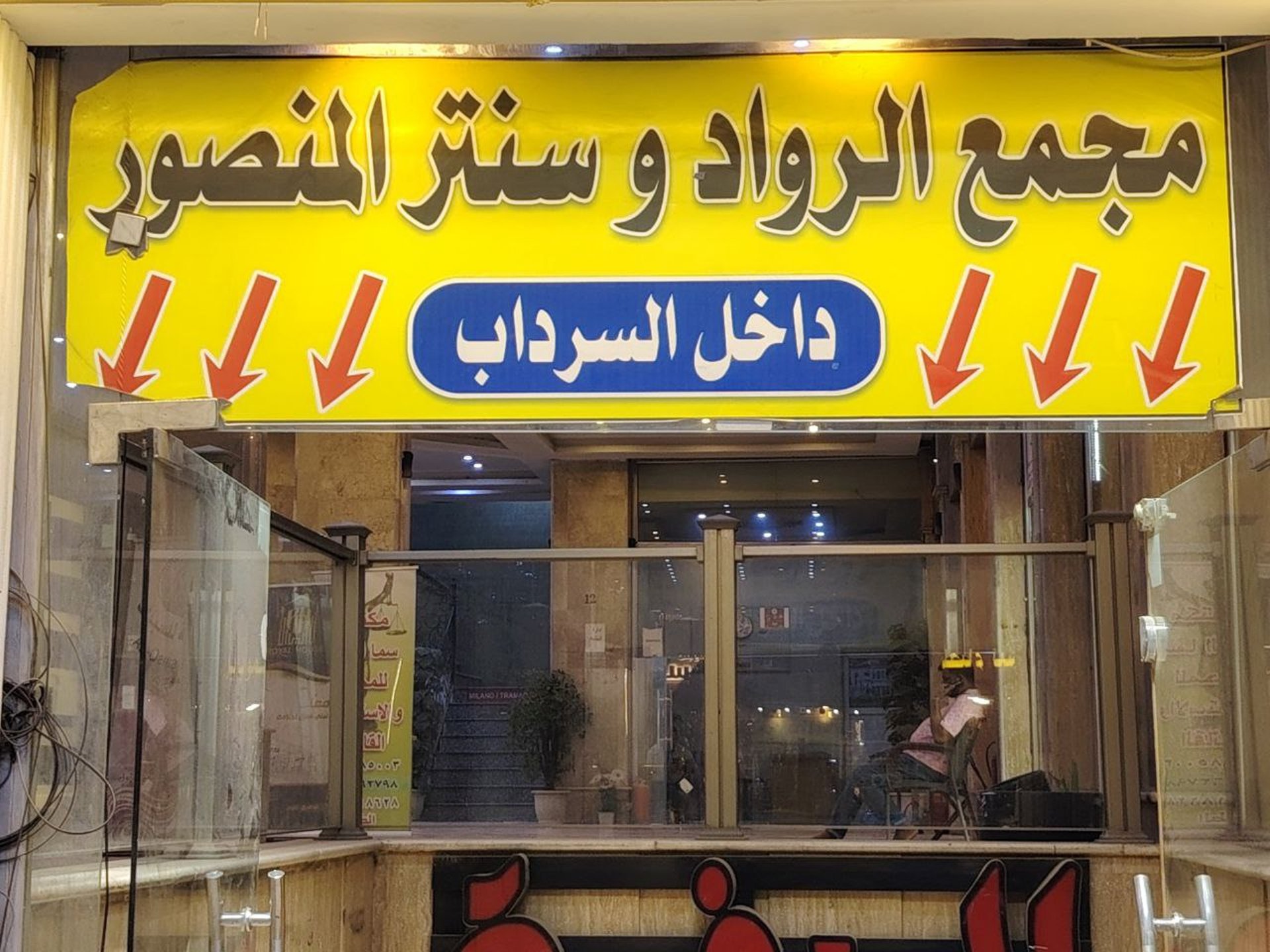 black and brown leather padded tub sofa