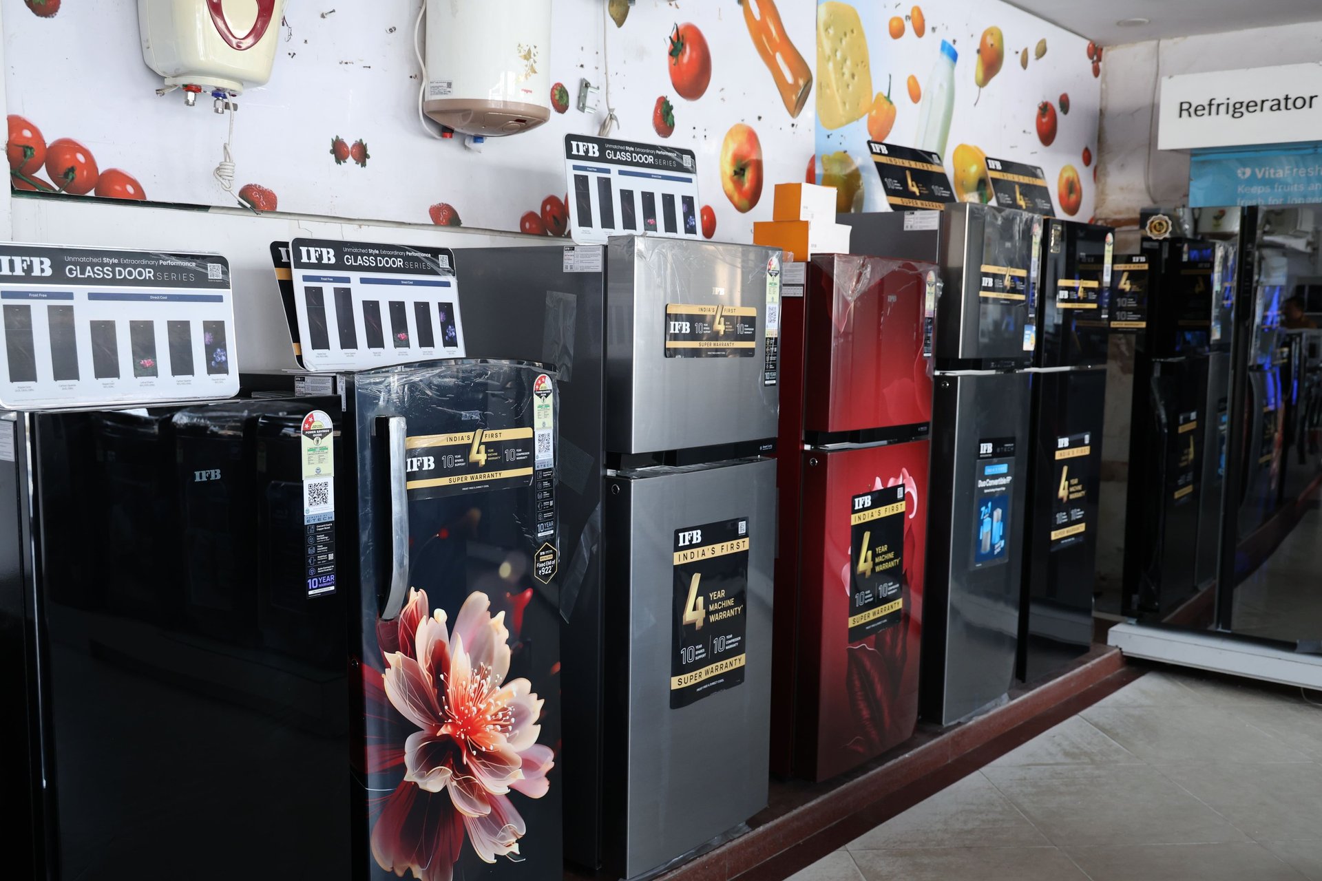 A bunch of toasters that are on a shelf