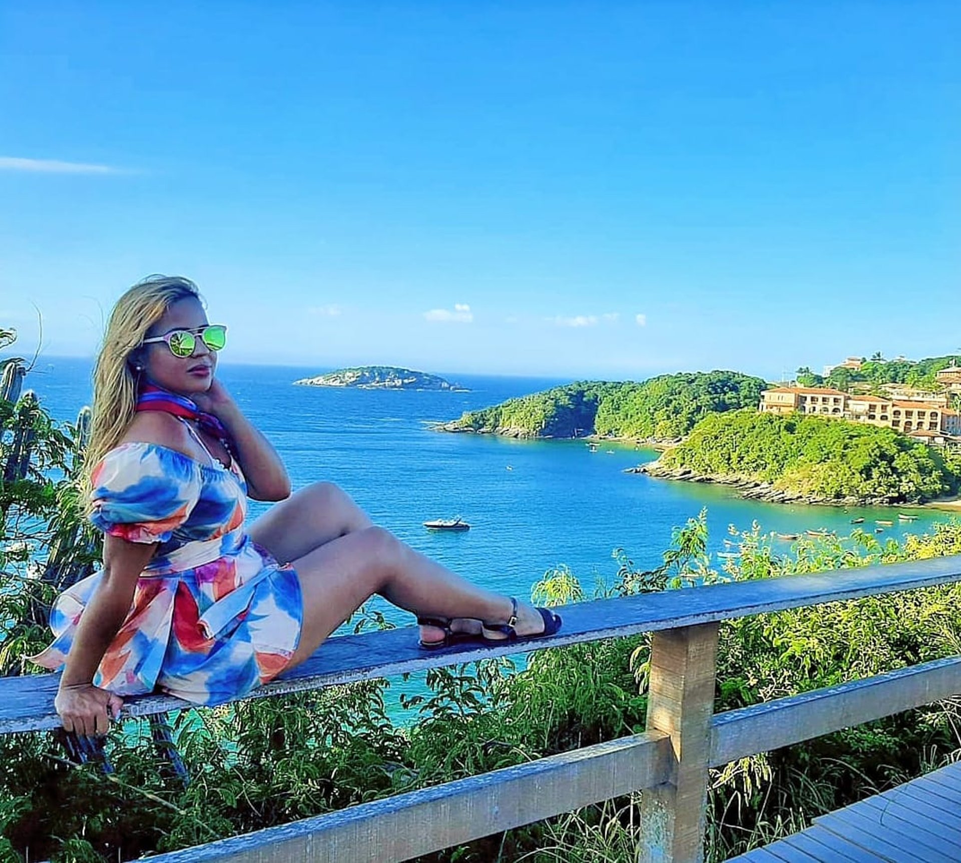 Sunset is seen through an airplane window.