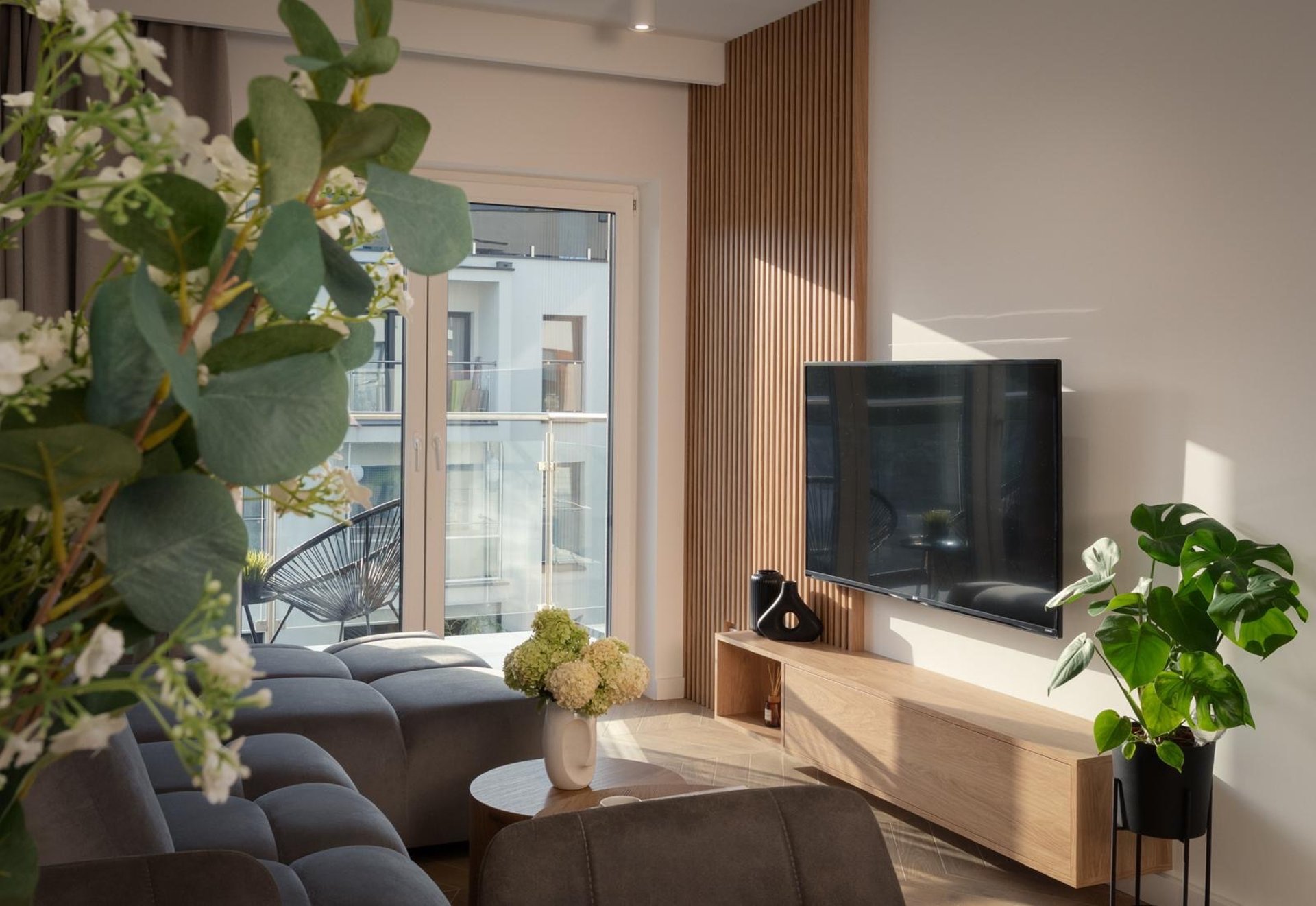 woman wearing yellow long-sleeved dress under white clouds and blue sky during daytime