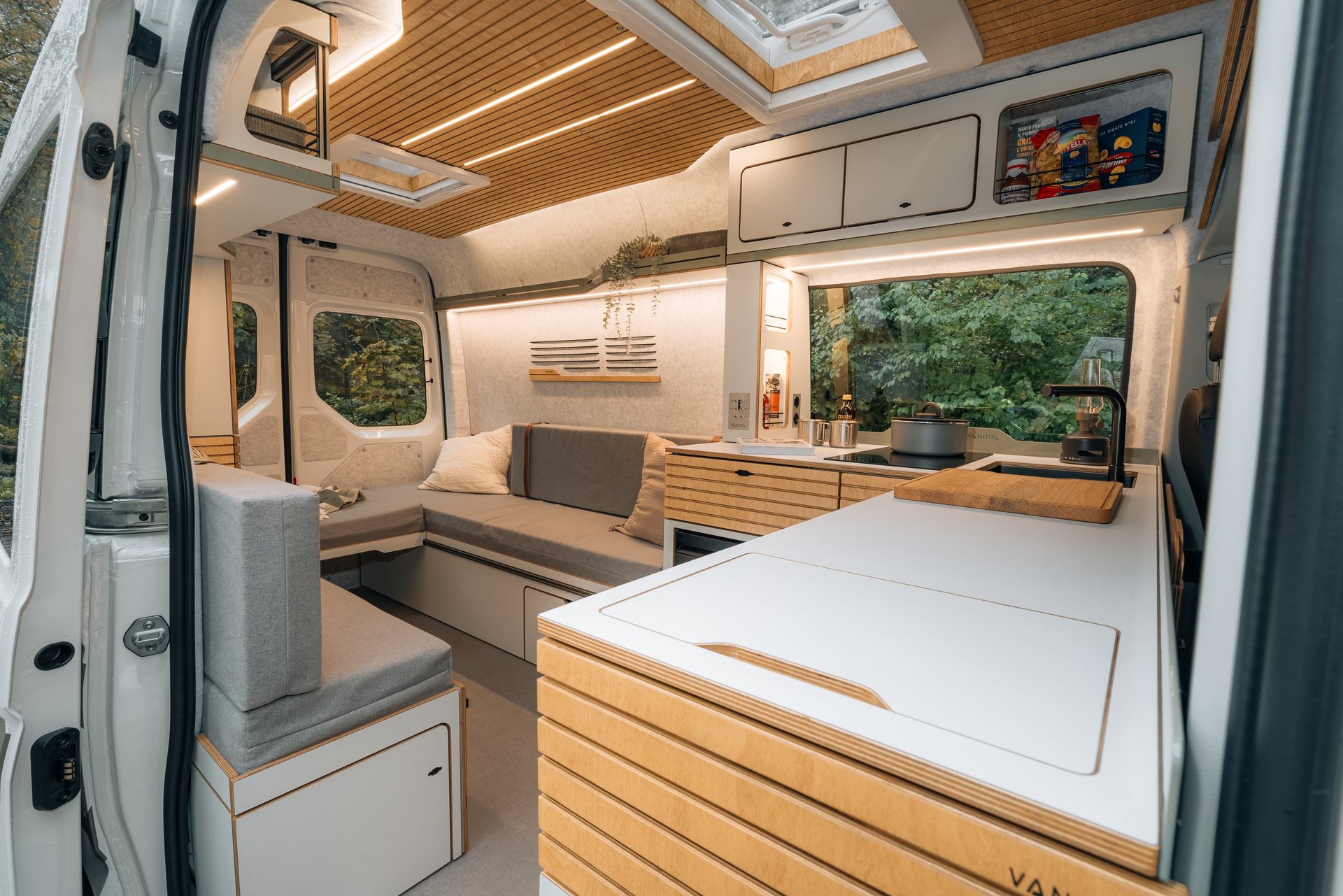 an abstract photo of a curved building with a blue sky in the background