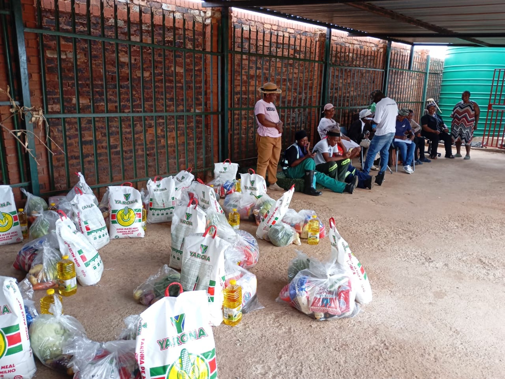 an abstract photo of a curved building with a blue sky in the background
