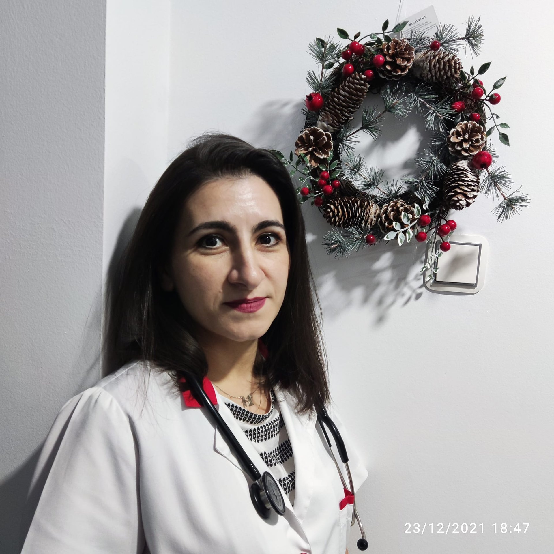woman wearing yellow long-sleeved dress under white clouds and blue sky during daytime
