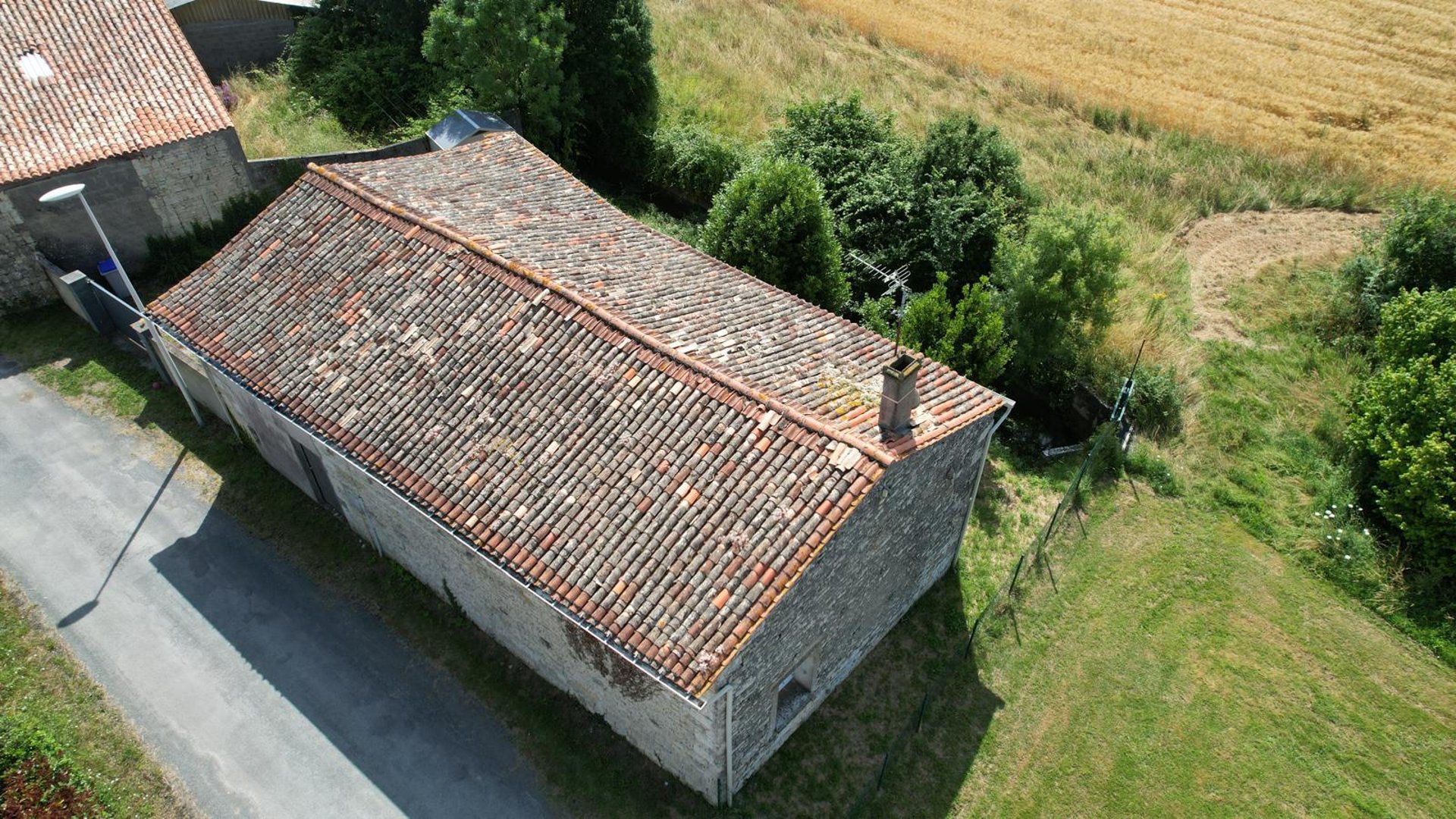 an abstract photo of a curved building with a blue sky in the background