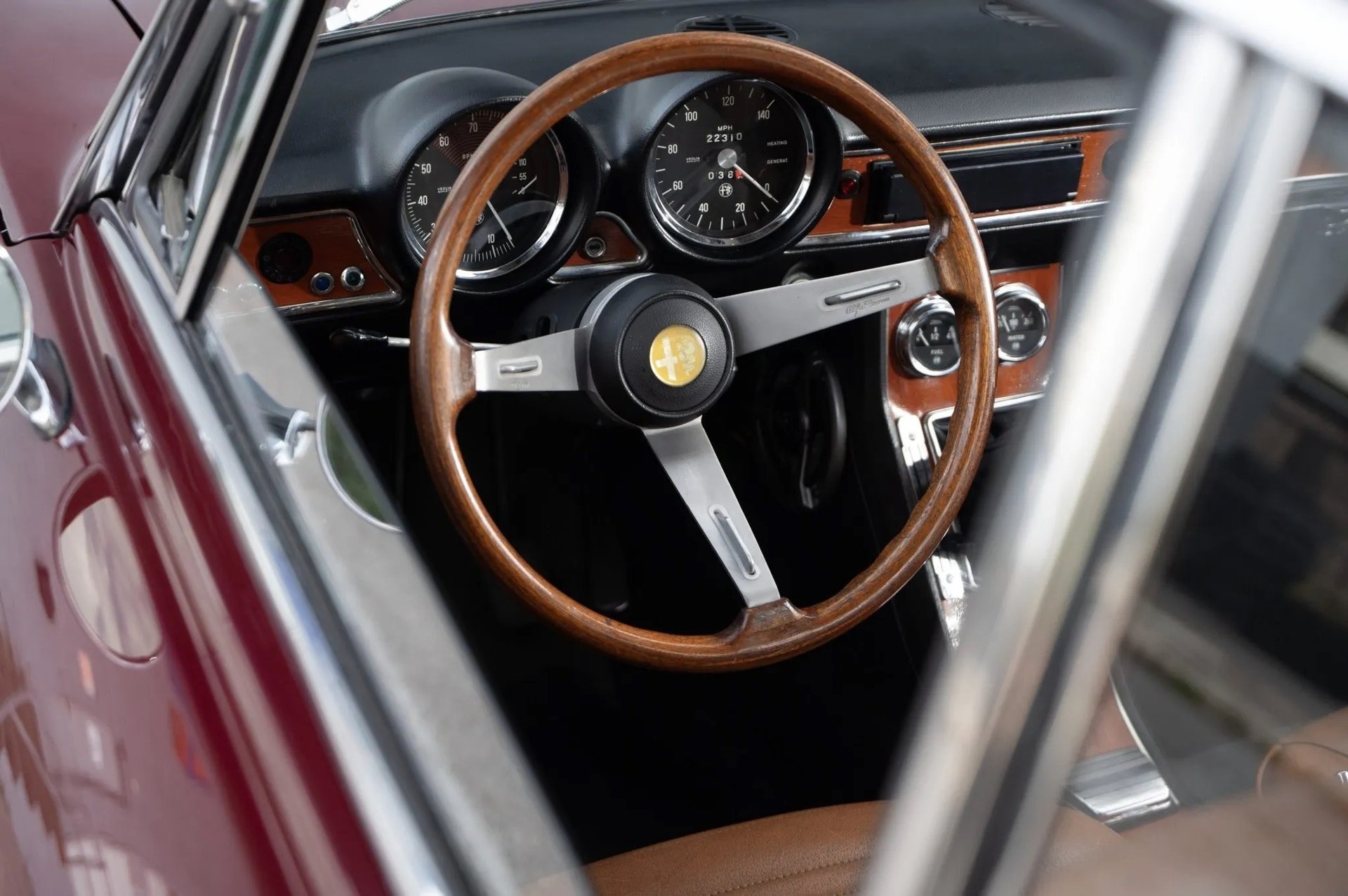 an abstract photo of a curved building with a blue sky in the background