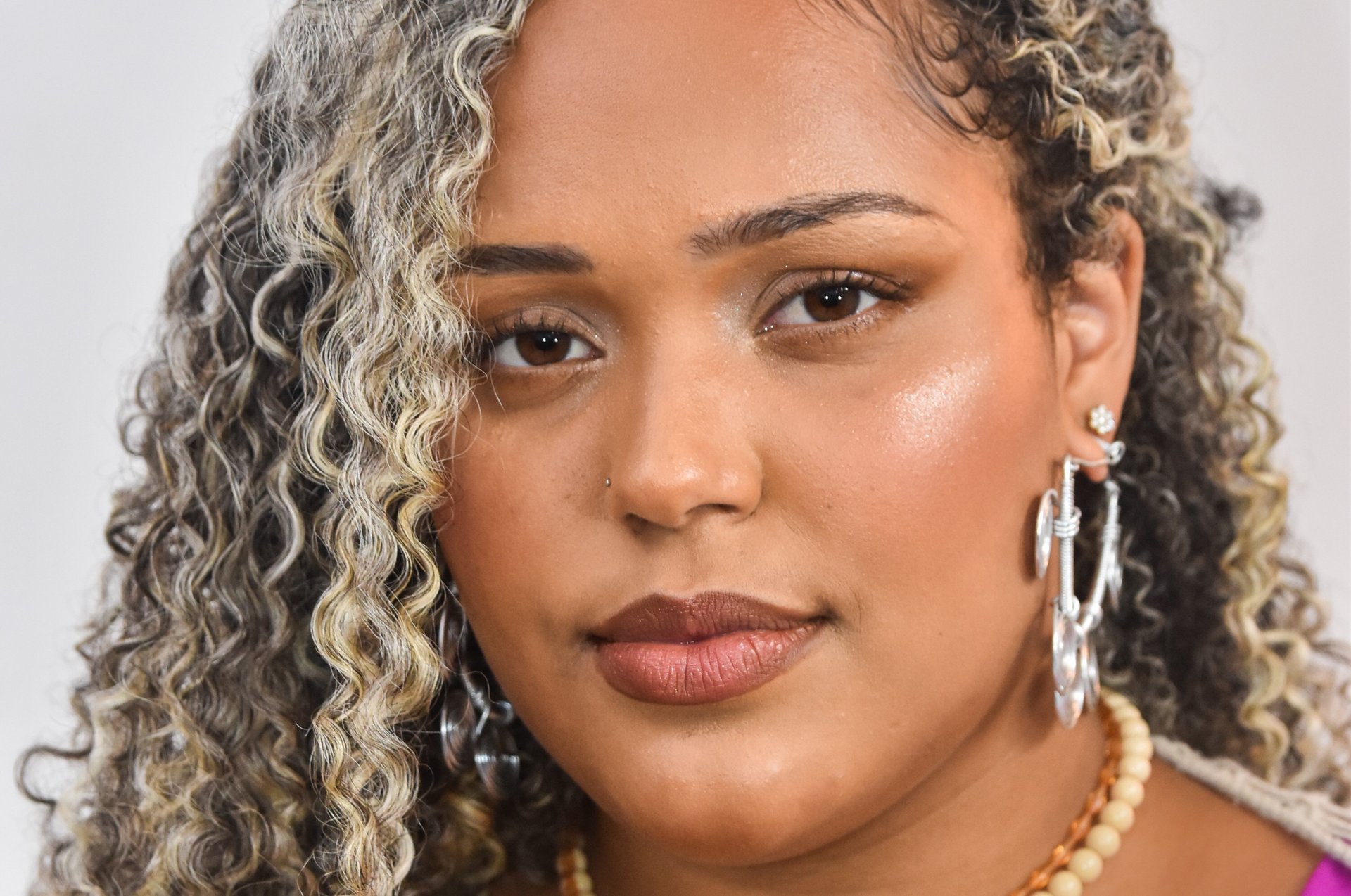 woman holding dried flower