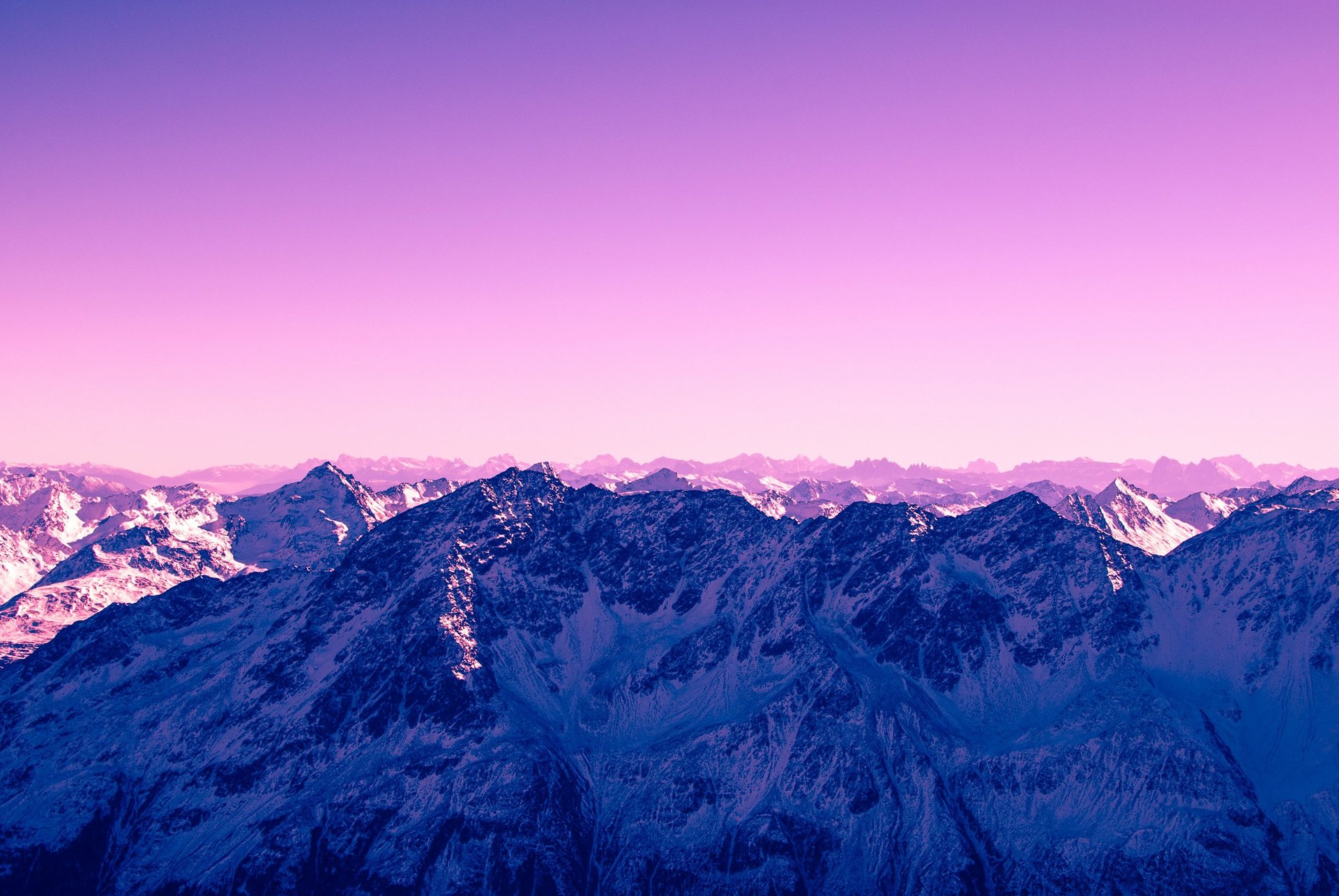 mountain range under blue sky