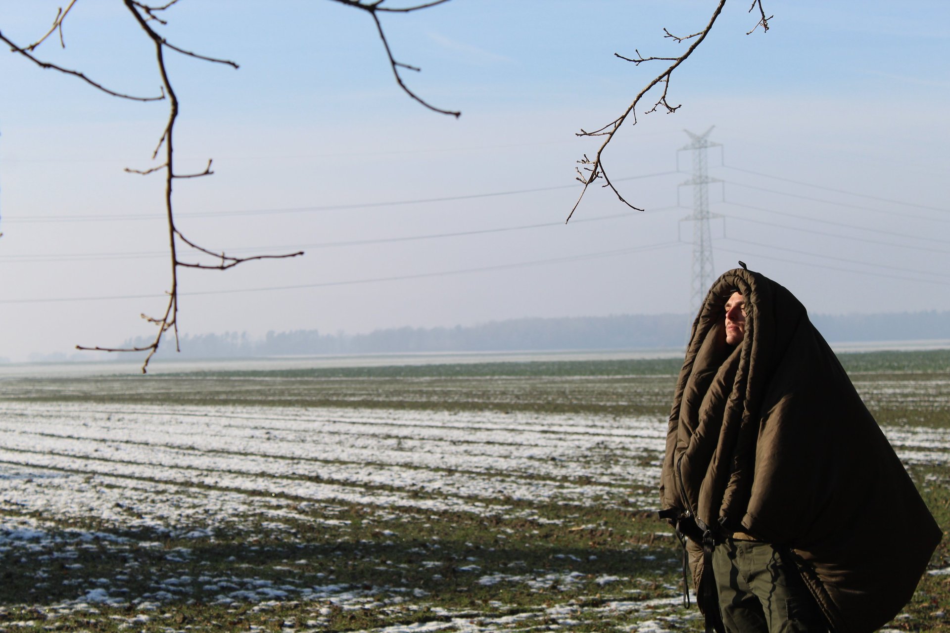 brown dirt road between green grass and trees during daytime