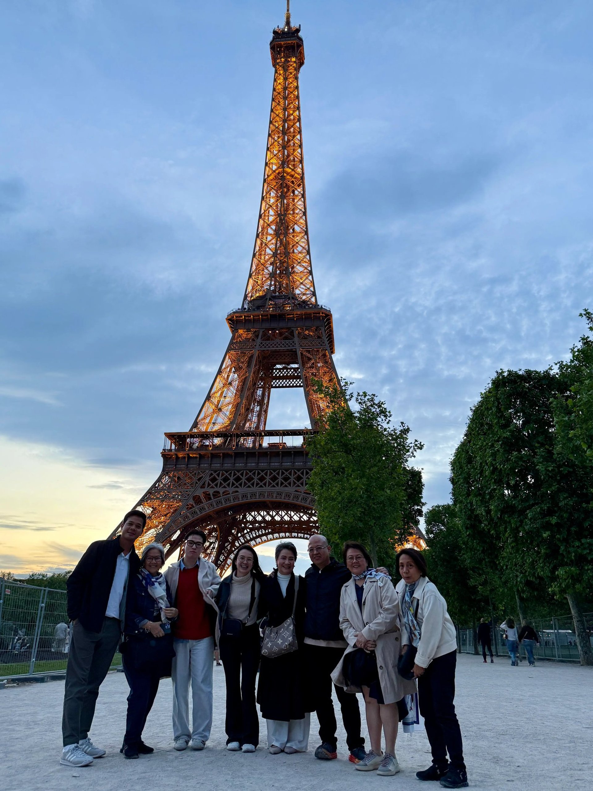 Filipino driver in Paris private tour group at the Eiffel Tower