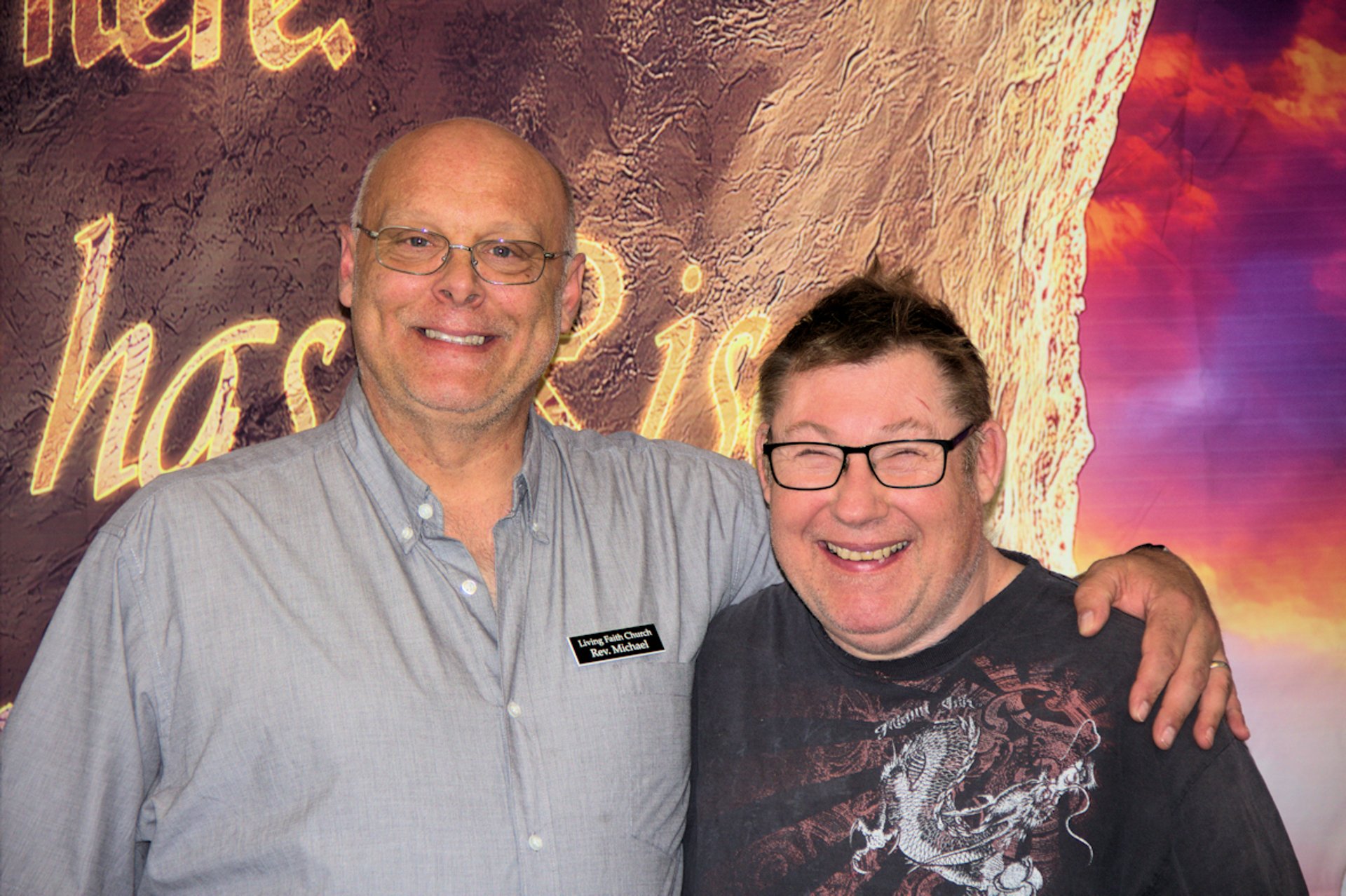 brown wooden cross on brown wooden wall