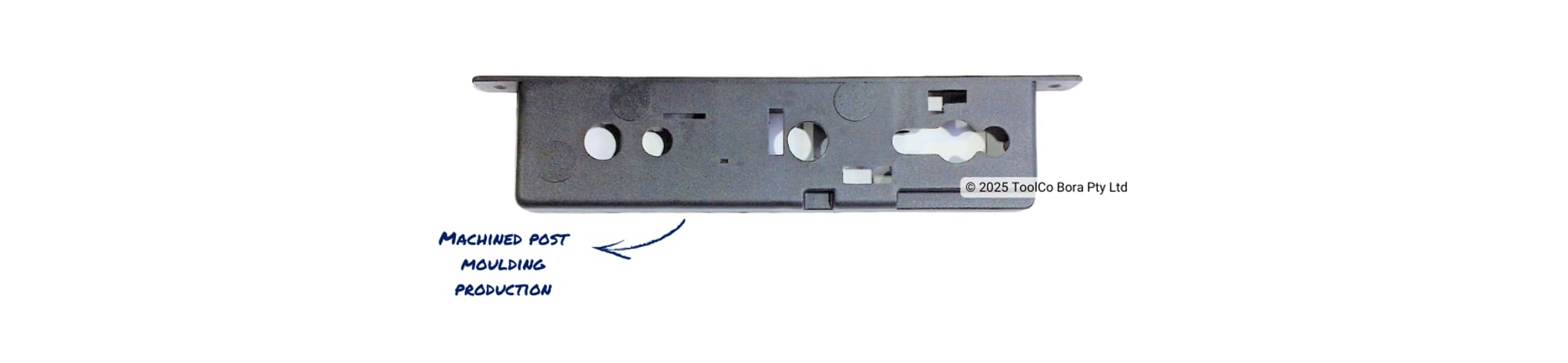 A black plastic injection moulded internal door handle on white background