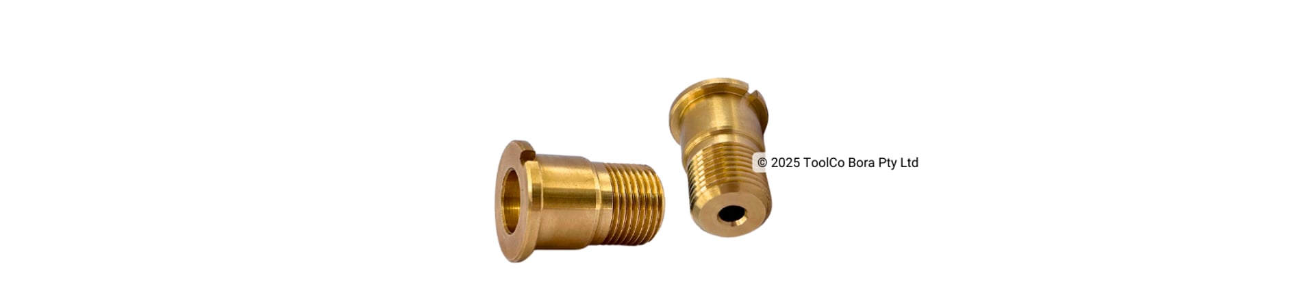 Two brass CNC machined parts on white background