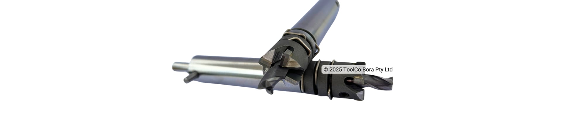 Two custom drill cutters with mill cutter tip and coupon catchers on white background