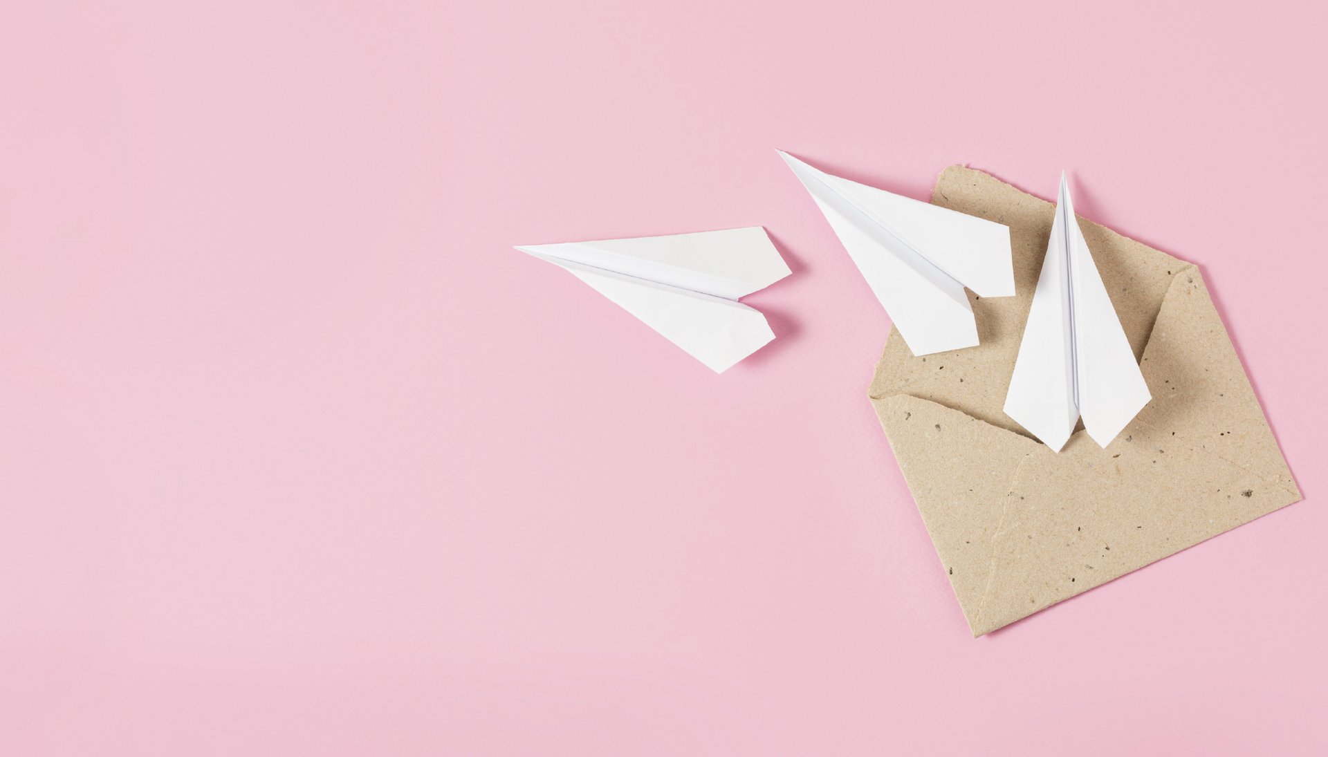 an abstract photo of a curved building with a blue sky in the background
