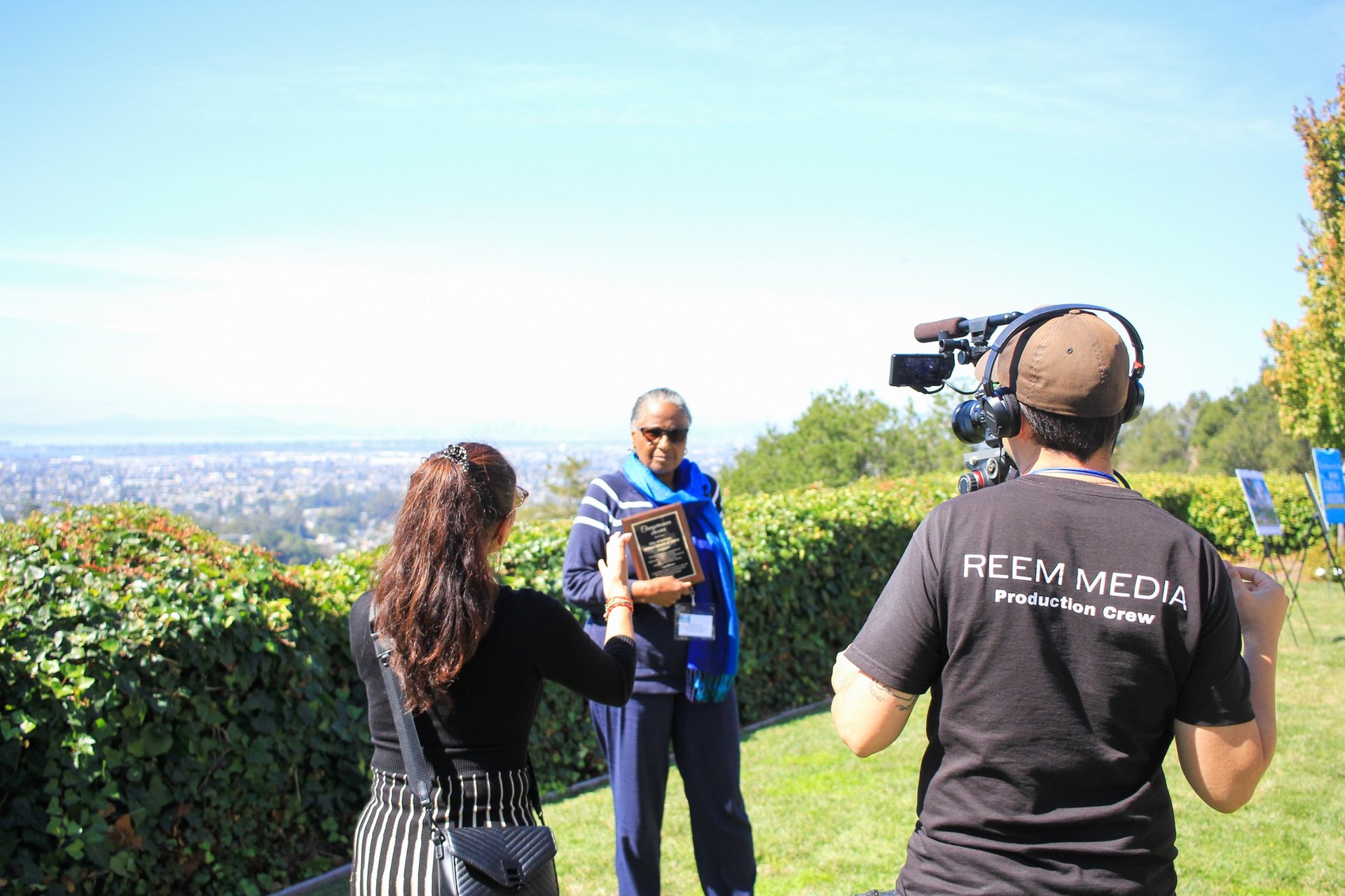 an abstract photo of a curved building with a blue sky in the background