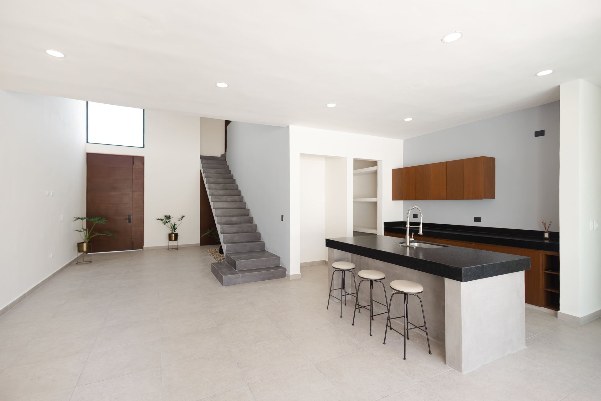 woman wearing yellow long-sleeved dress under white clouds and blue sky during daytime