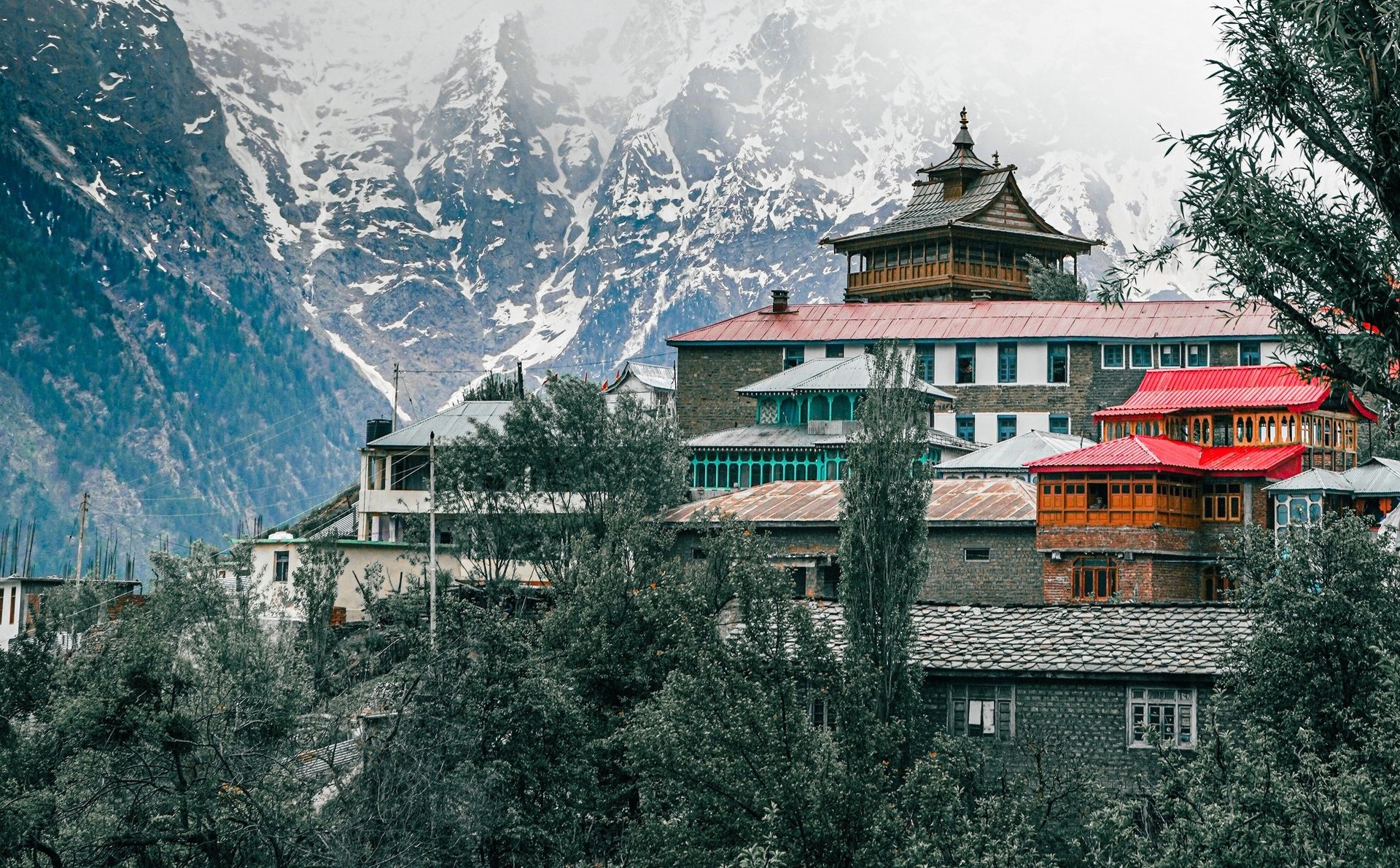 black and brown leather padded tub sofa