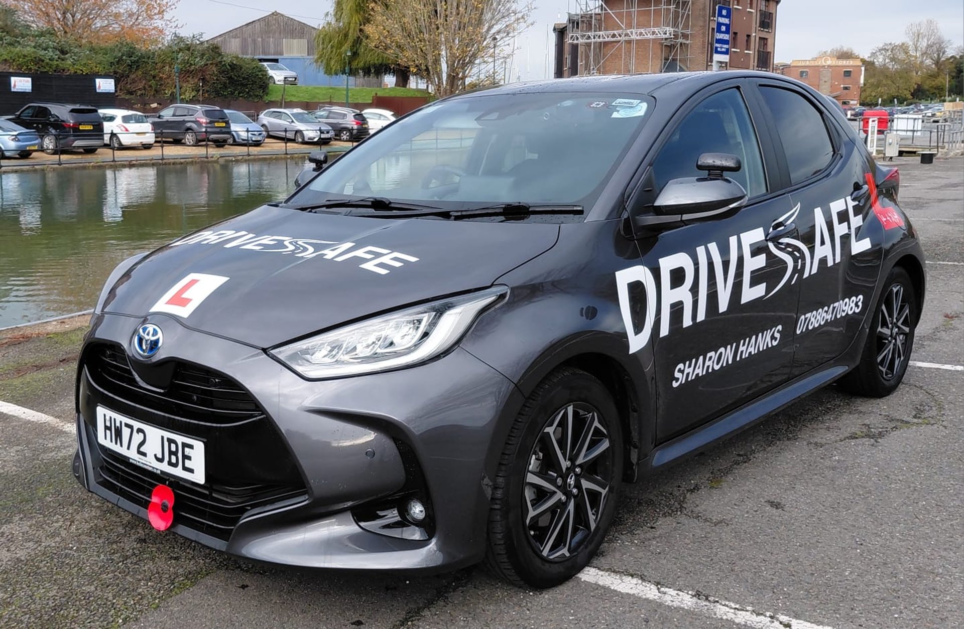 an abstract photo of a curved building with a blue sky in the background