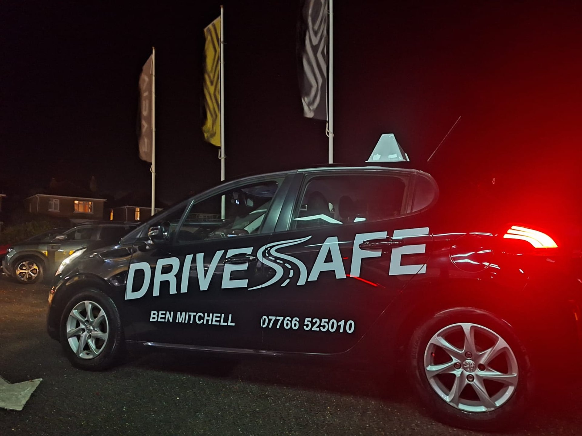 an abstract photo of a curved building with a blue sky in the background