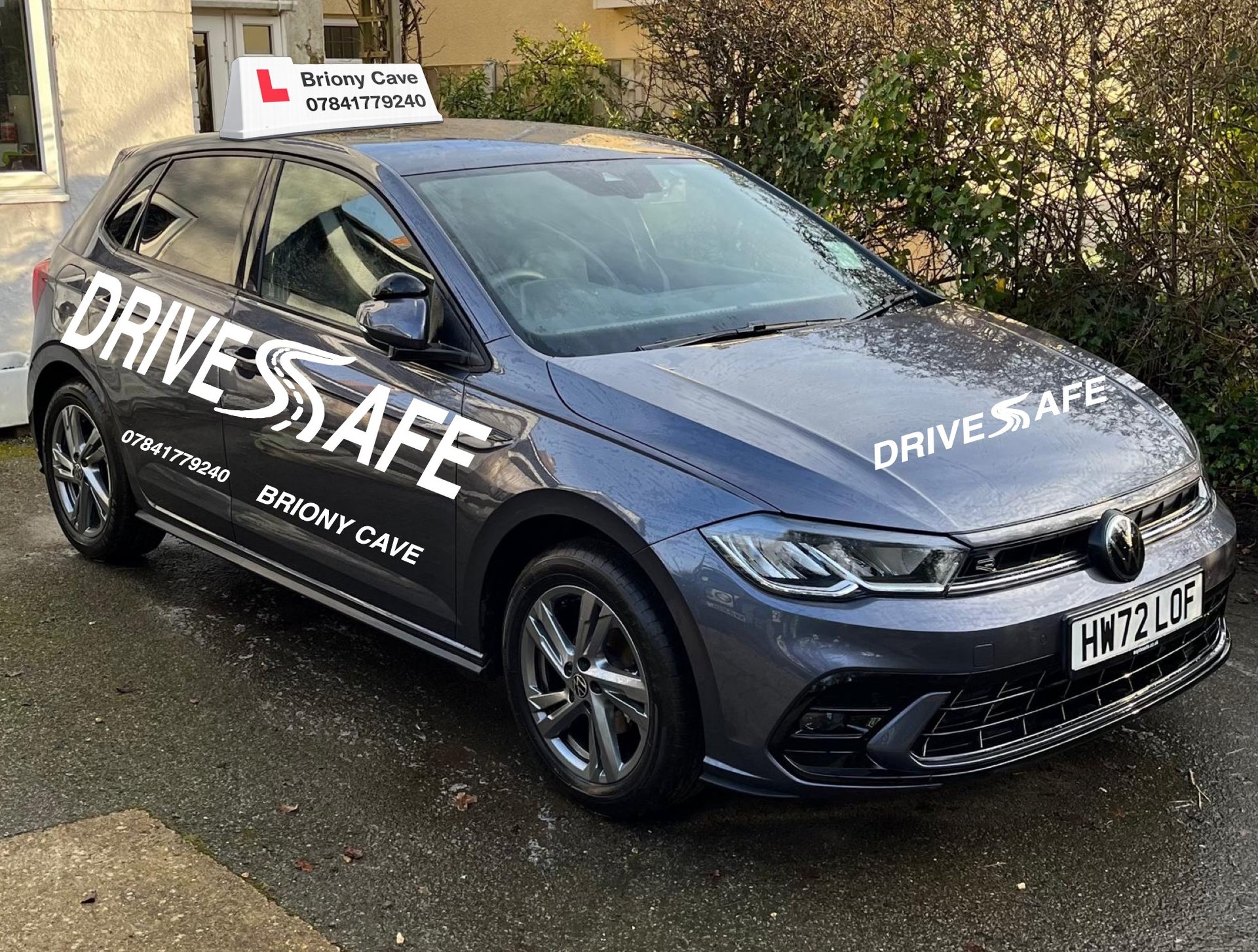 an abstract photo of a curved building with a blue sky in the background