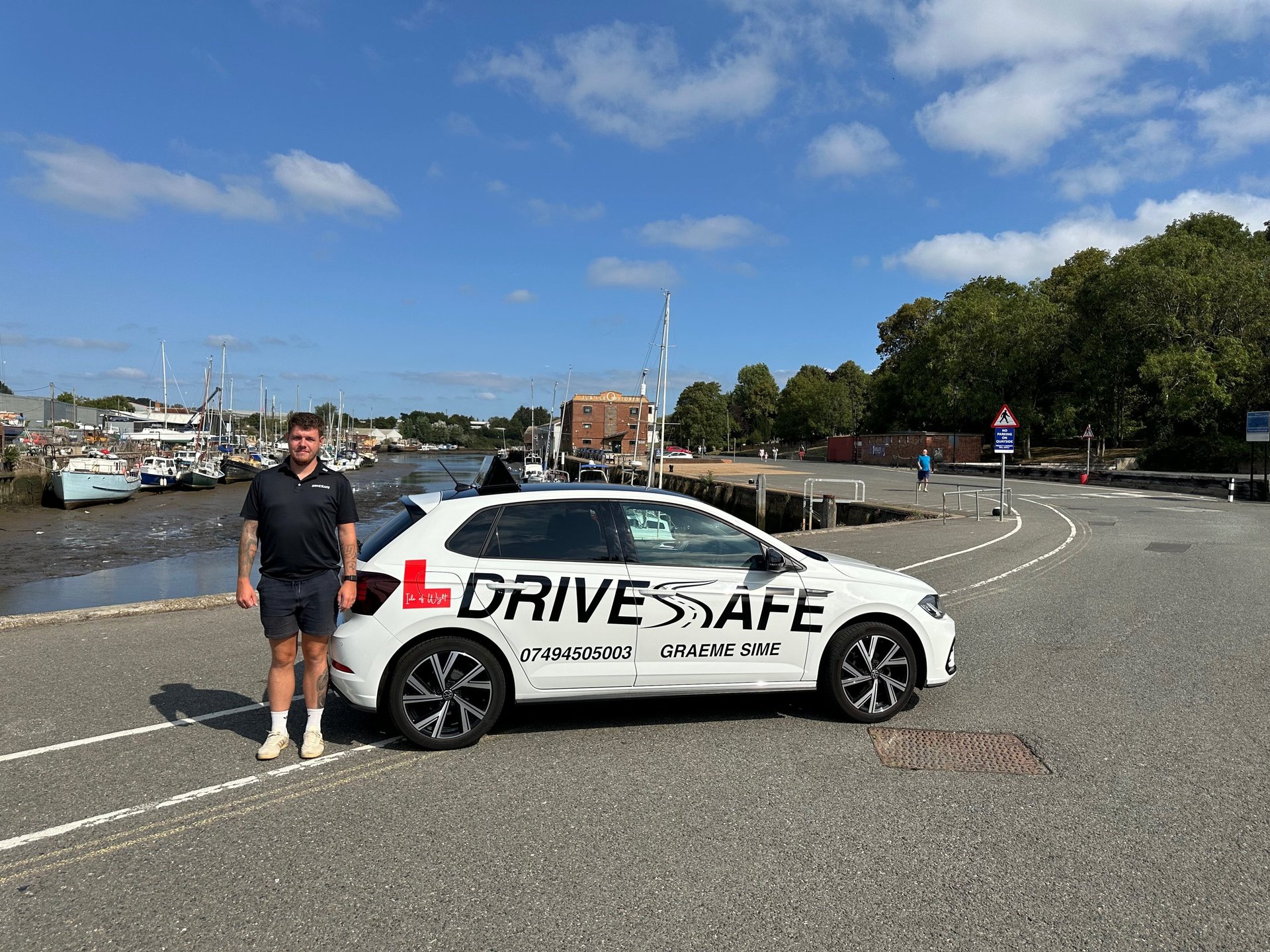 an abstract photo of a curved building with a blue sky in the background