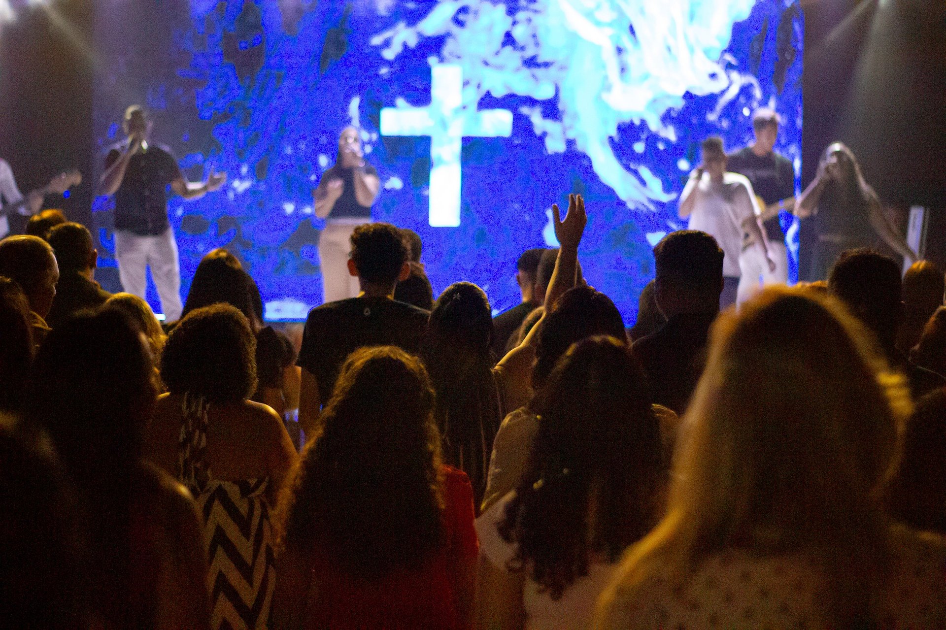 an abstract photo of a curved building with a blue sky in the background