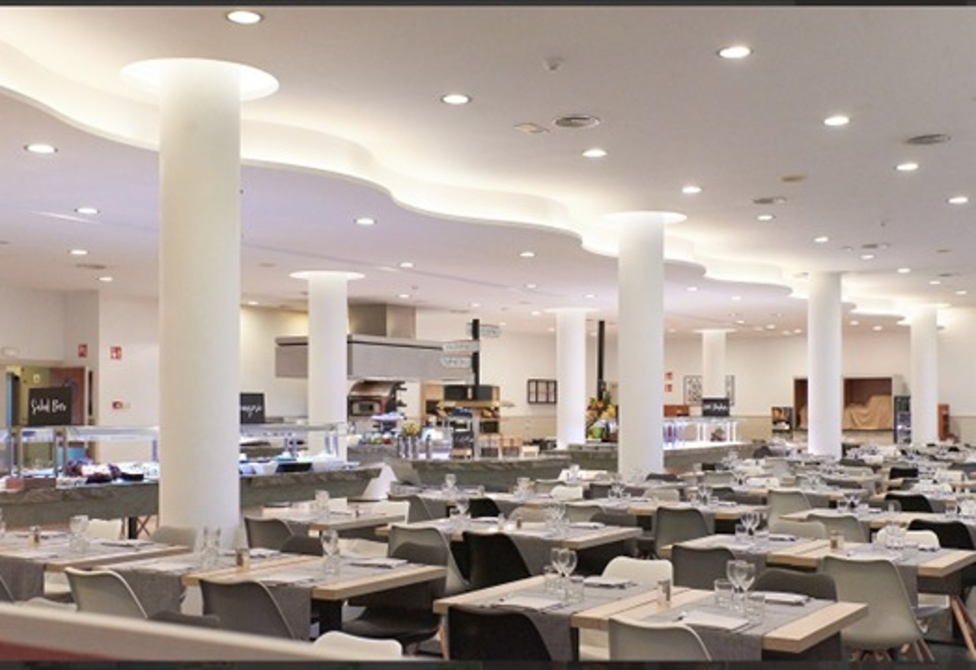 woman wearing yellow long-sleeved dress under white clouds and blue sky during daytime