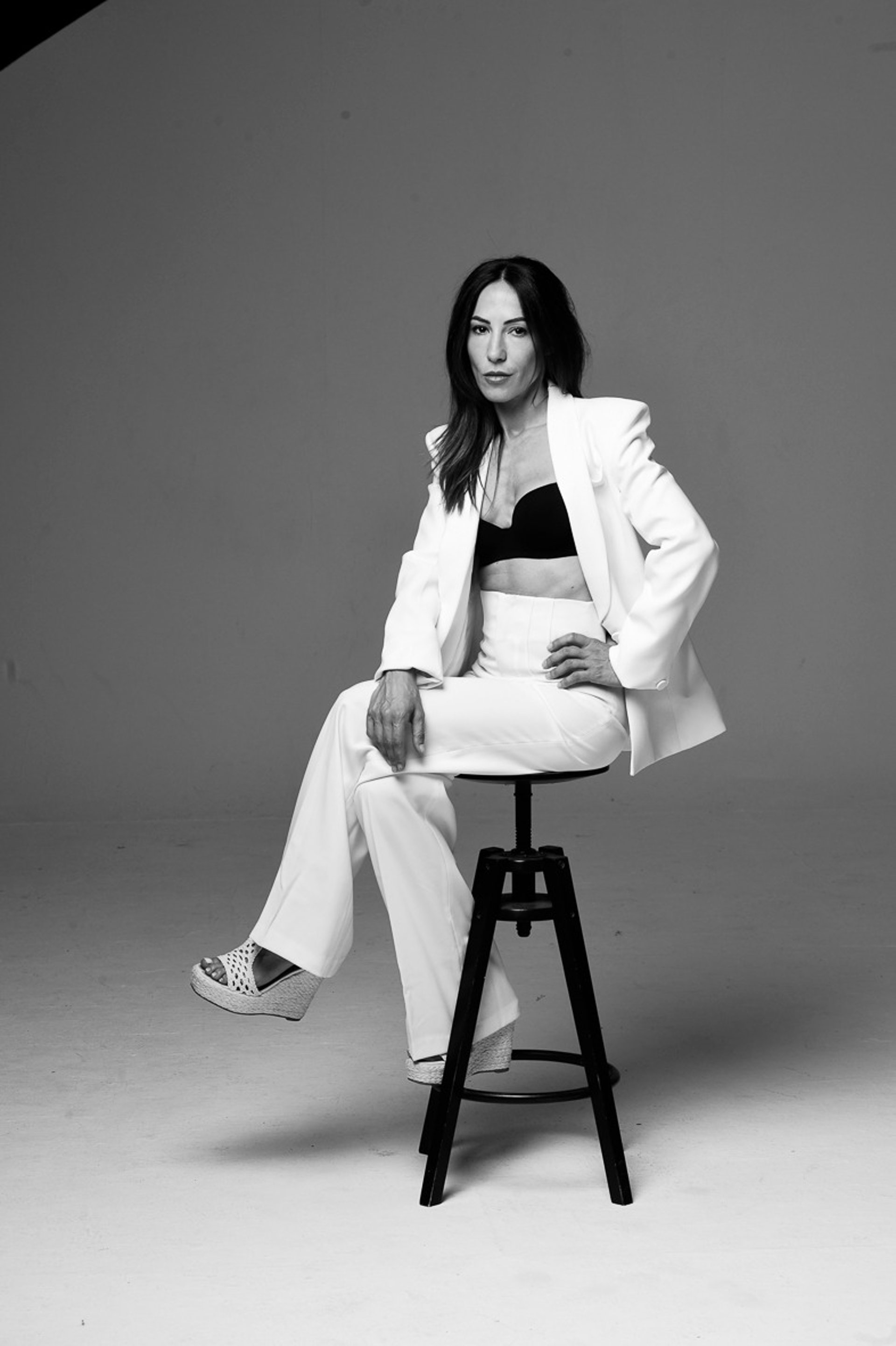 black and brown leather padded tub sofa
