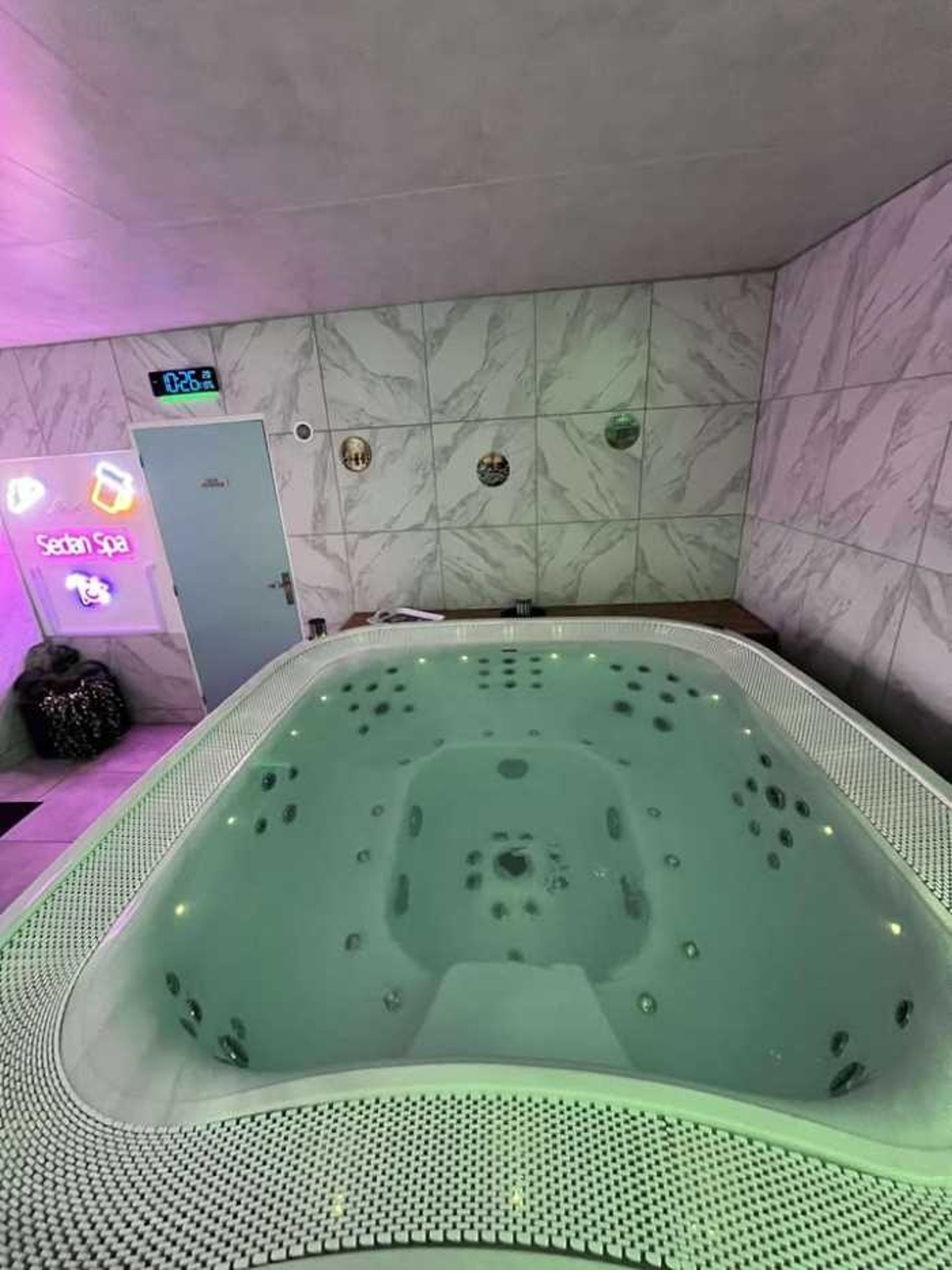 black and brown leather padded tub sofa