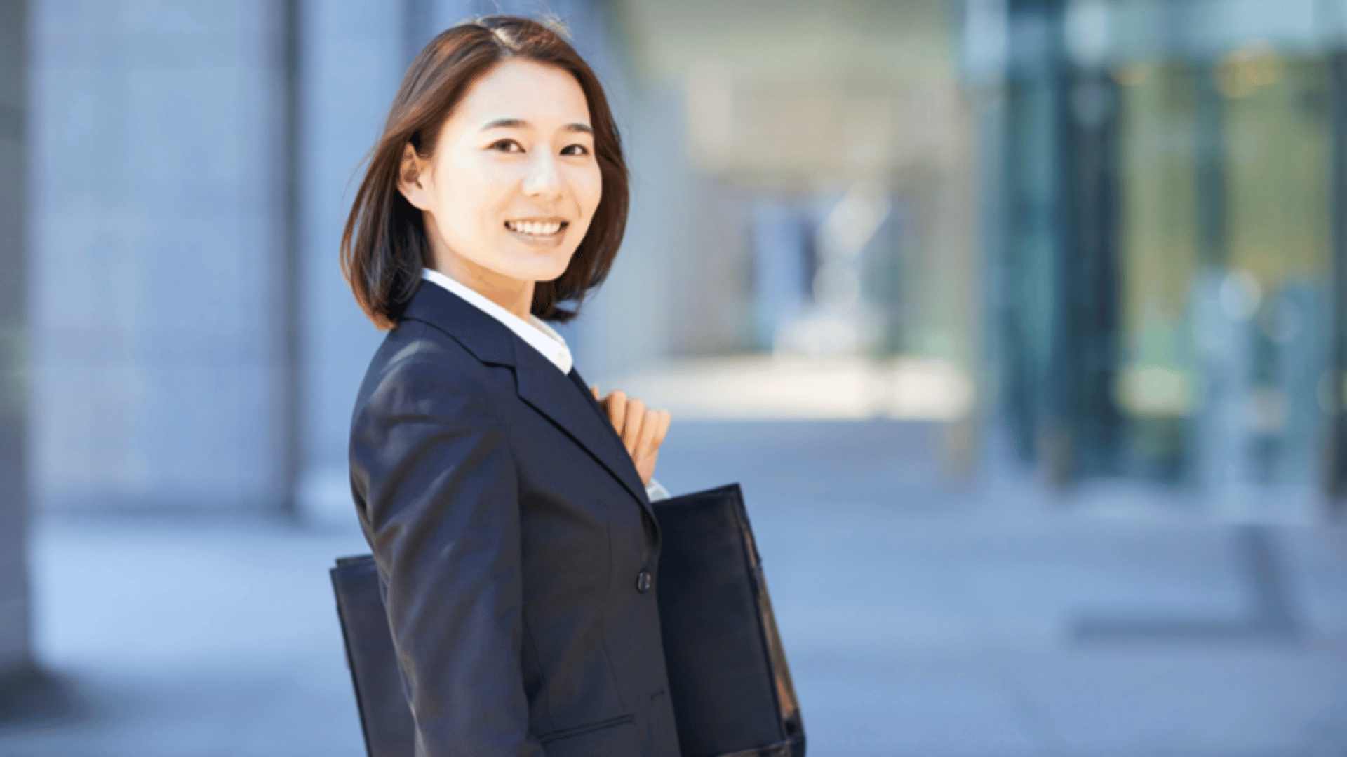 shallow focus photo of woman in gray jacket