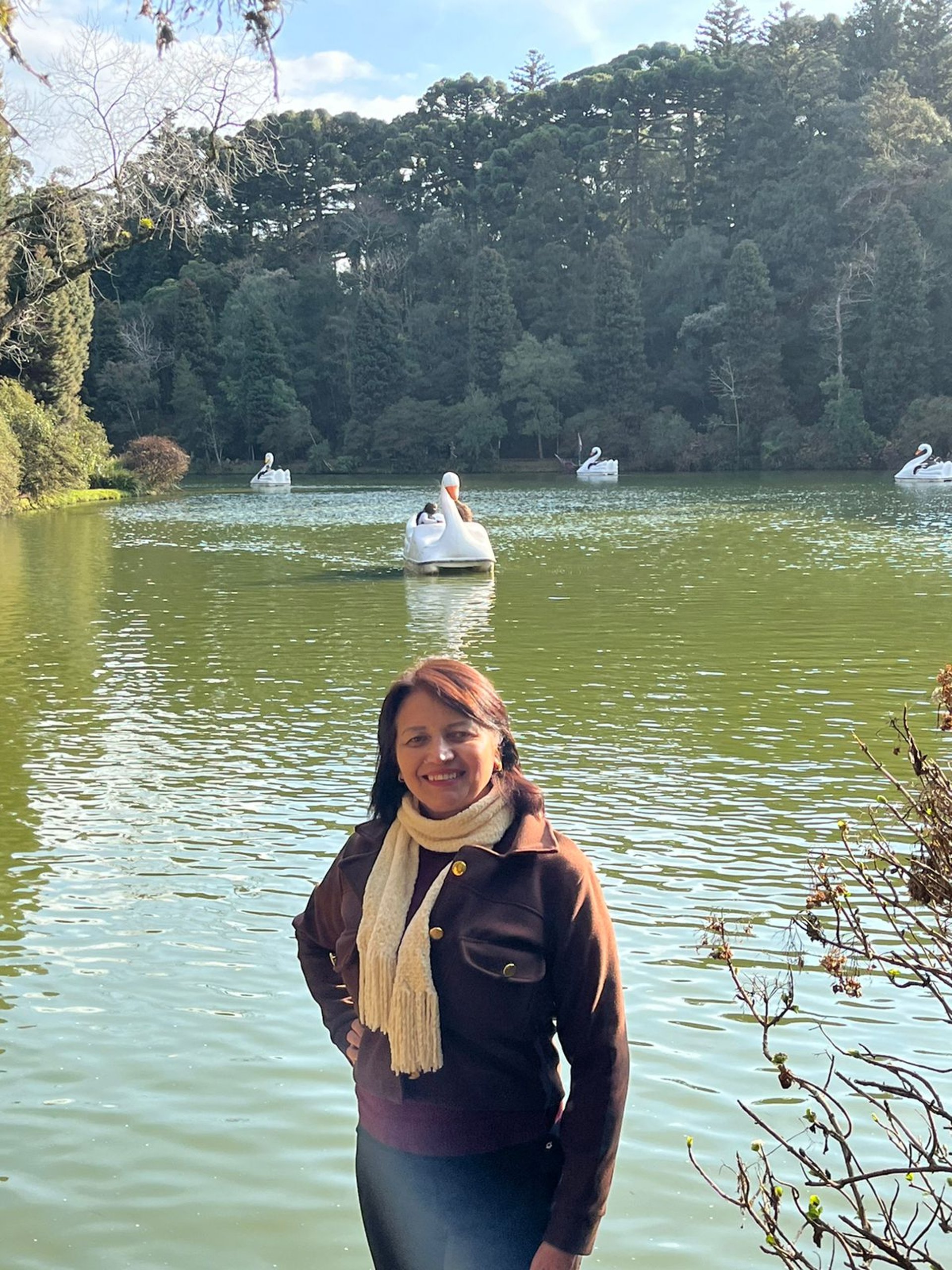 man and woman standing in front of brown concrete building during daytime