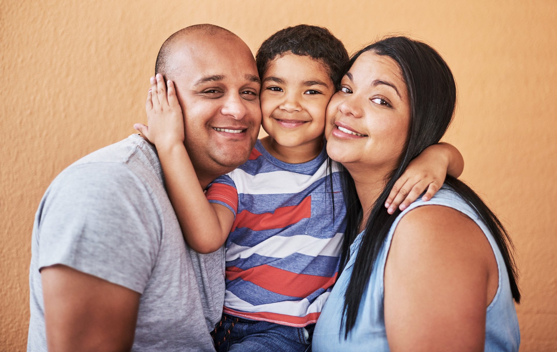 an abstract photo of a curved building with a blue sky in the background