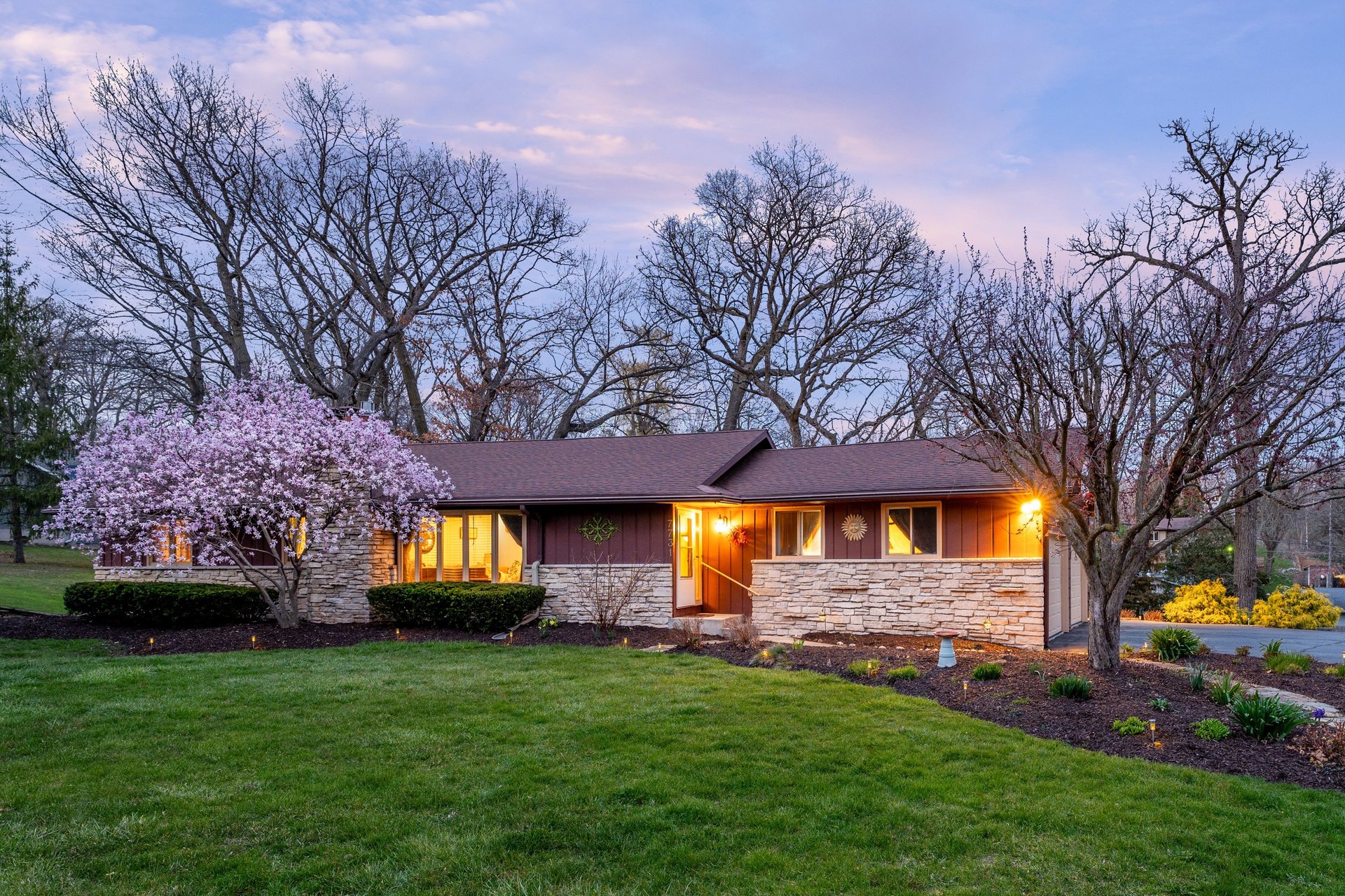 an abstract photo of a curved building with a blue sky in the background