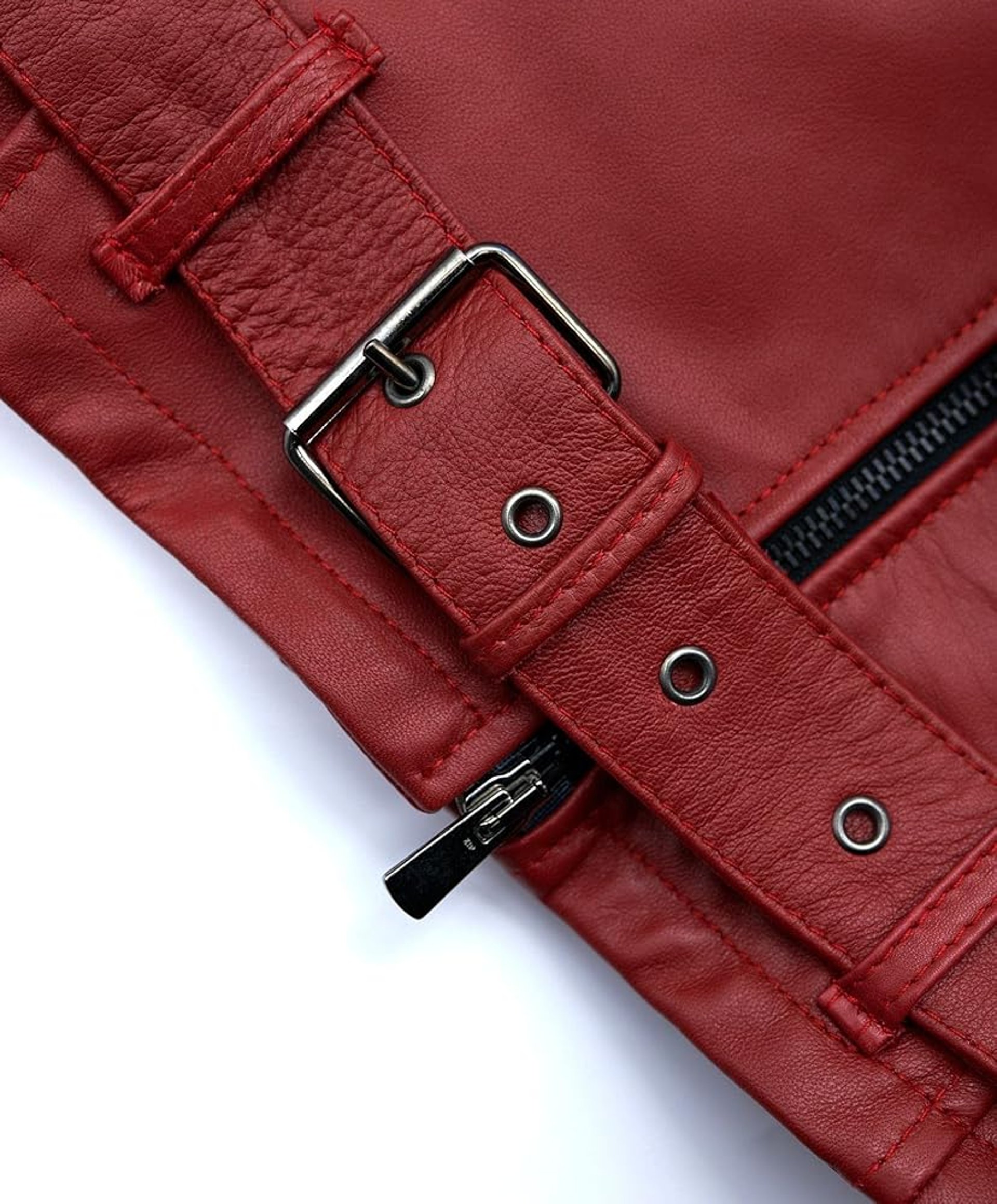 man holding his leather jacket