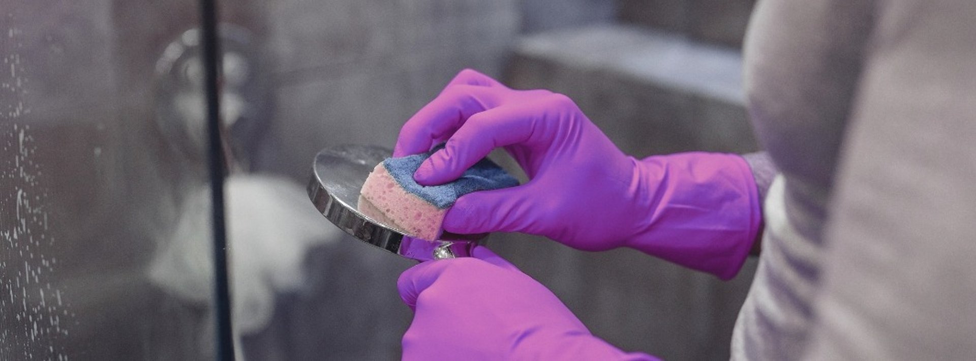 silhouette of man standing near glass window during daytime