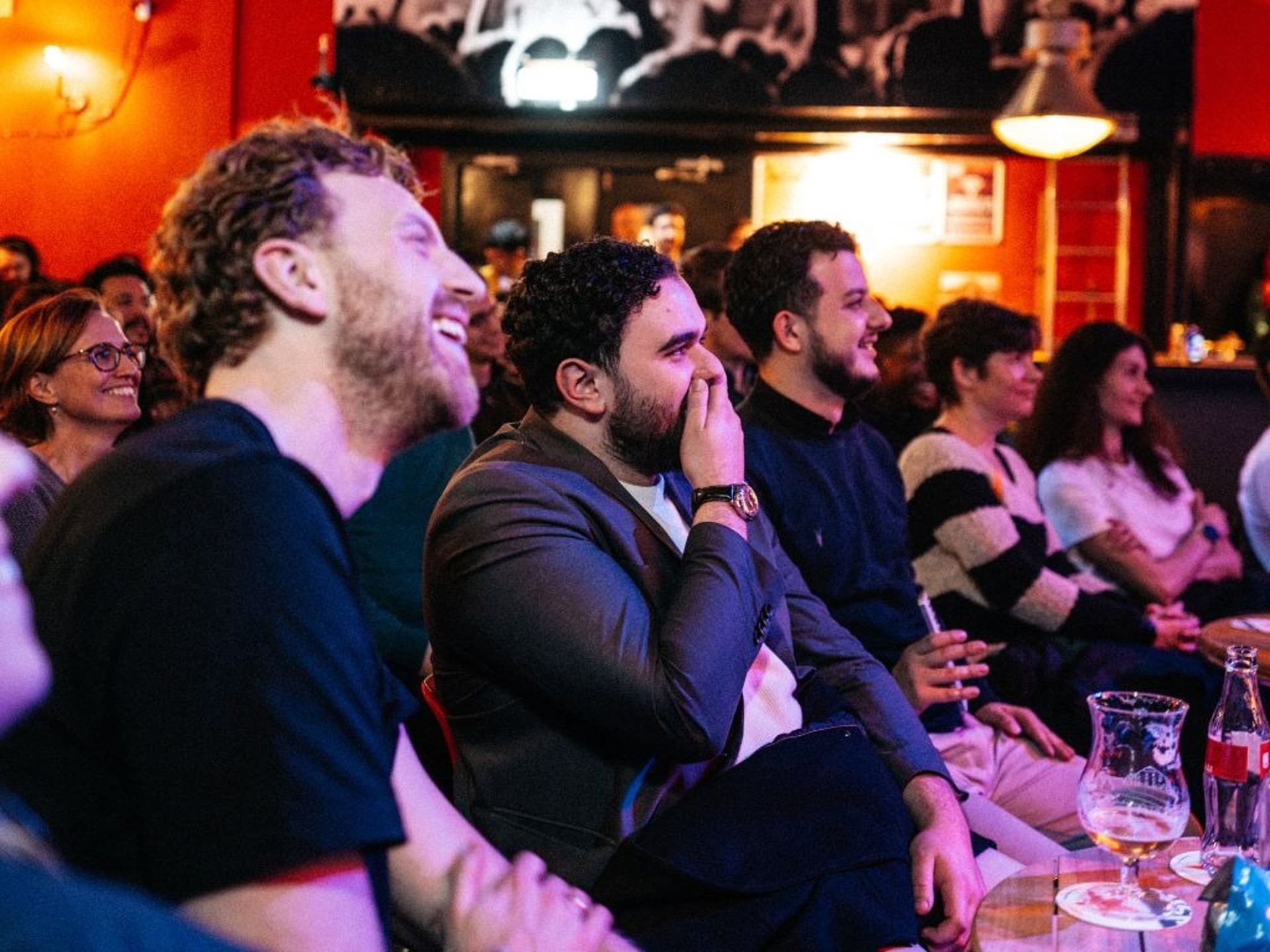 an abstract photo of a curved building with a blue sky in the background