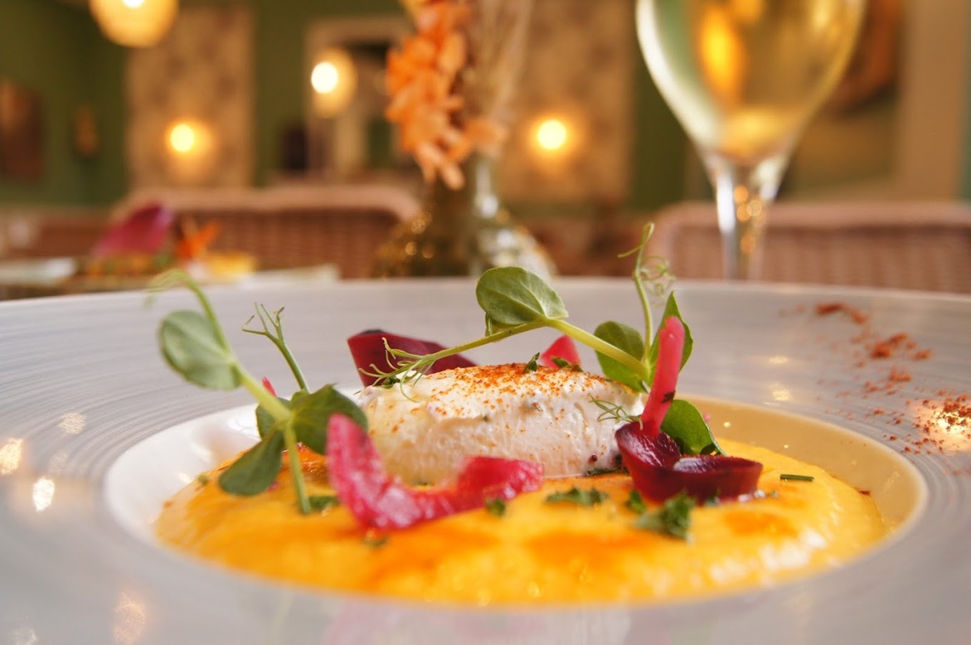 an abstract photo of a curved building with a blue sky in the background